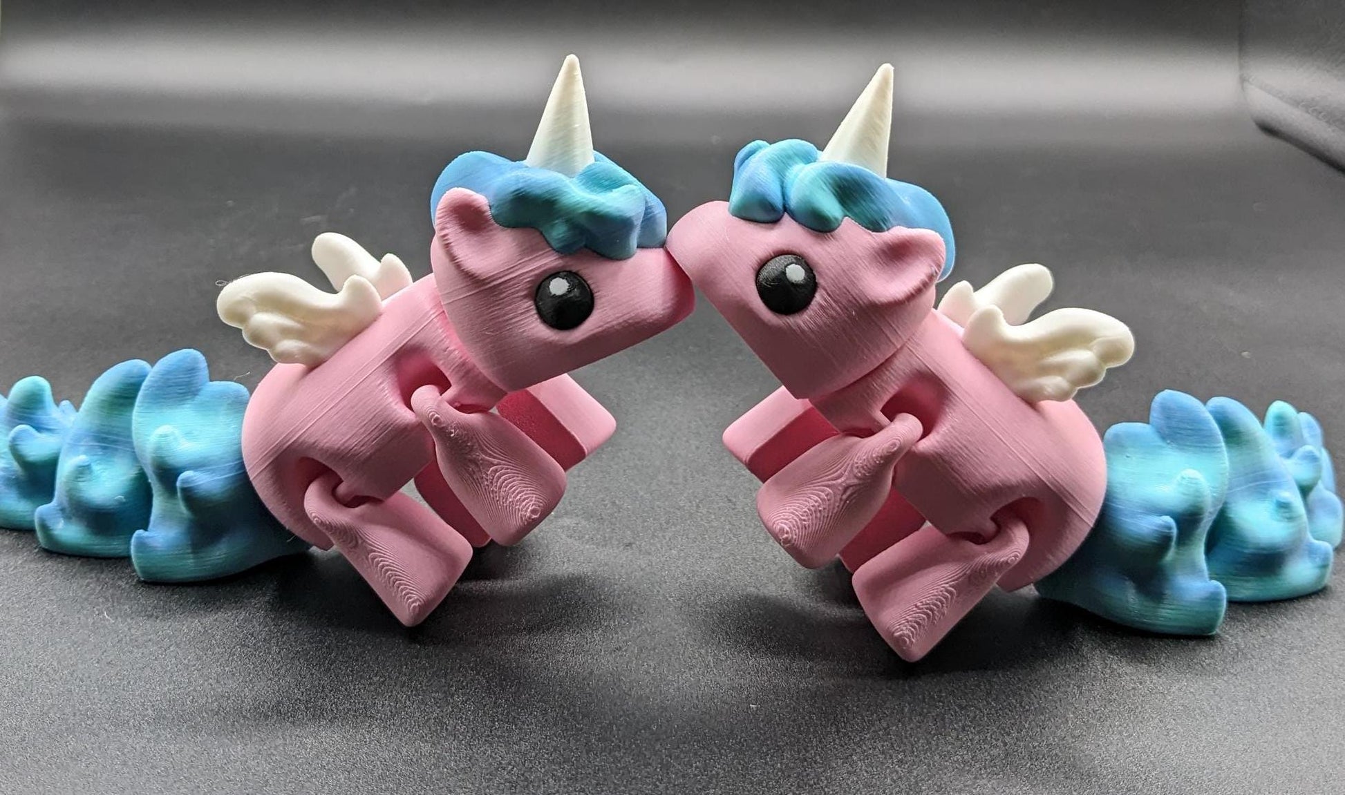 Our Magical Articulated Baby Unicorn Fidget Toy is perfect for fidgeting, imaginative play, or as a whimsical desk accessory. The perfect gift for the unicorn lover in your life or gift for yourself!
