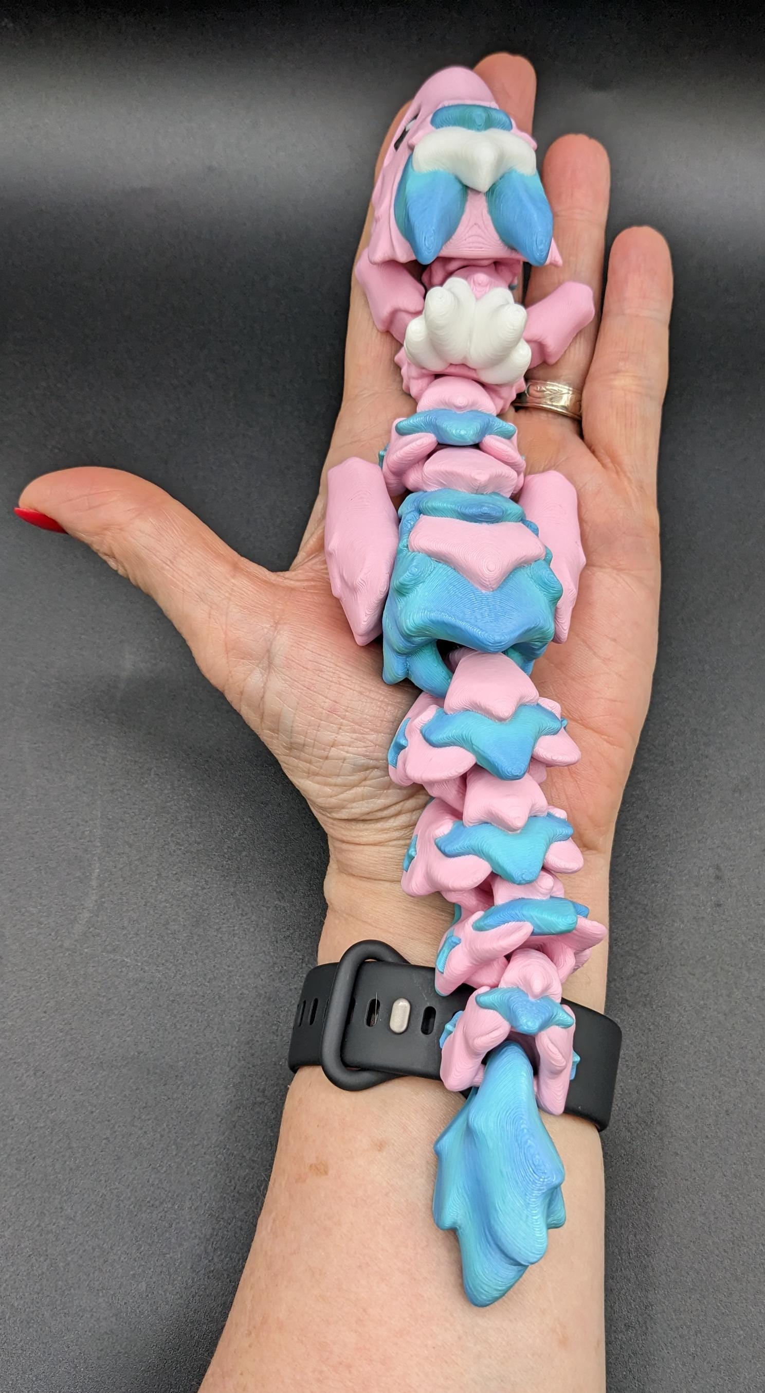 Our Sweet Articulated Baby Atria Fidget Toy is a delightful & interactive creation designed to bring joy, creativity, & stress relief into your life! Our fidget toy features a unique & sweet design making it perfect for fidgeting &  imaginative play.