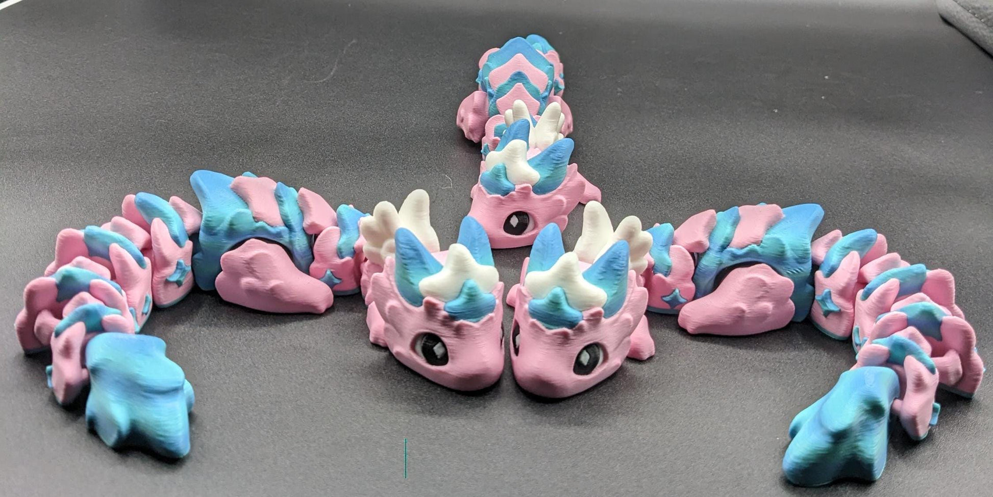 Our Sweet Articulated Baby Atria Fidget Toy is a delightful & interactive creation designed to bring joy, creativity, & stress relief into your life! Our fidget toy features a unique & sweet design making it perfect for fidgeting &  imaginative play.