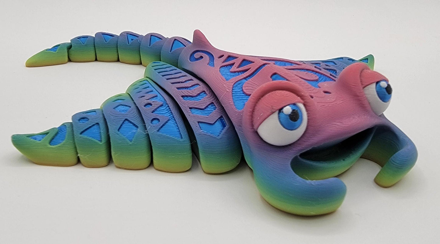 Meet our adorable 3D Printed Tribal Tattooed Manta Ray Fidget Toy – your companion for stress relief and endless fun! Crafted with precision, this Tattooed Manta Ray is more than just a toy; it's a delightful escape from the daily hustle.