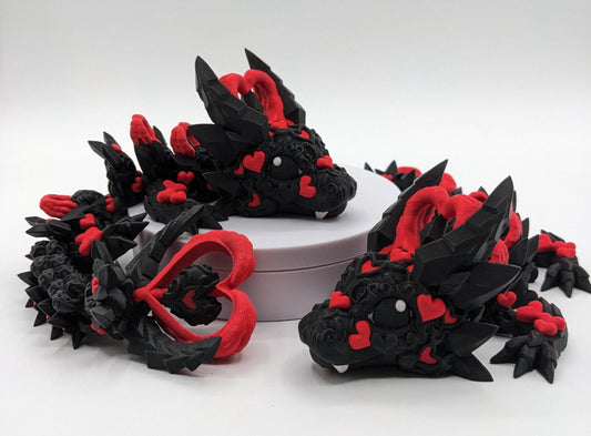 Meet the Elegant Articulated Baby Dark Heart Dragon, a stunning blend of mystery, grace, and intricate design. This captivating 3D-printed dragon is perfect for dragon enthusiasts, collectors, or anyone who loves unique and magical creations.