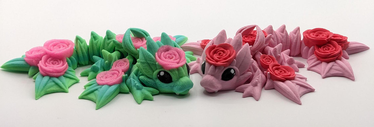 Add a touch of magic and charm to your day with the Adorable Articulated Baby Rose Dragon Fidget Toy! This enchanting 3D-printed dragon is inspired by the beauty of roses and the whimsical allure of baby dragons. The perfect Valentine's gift.