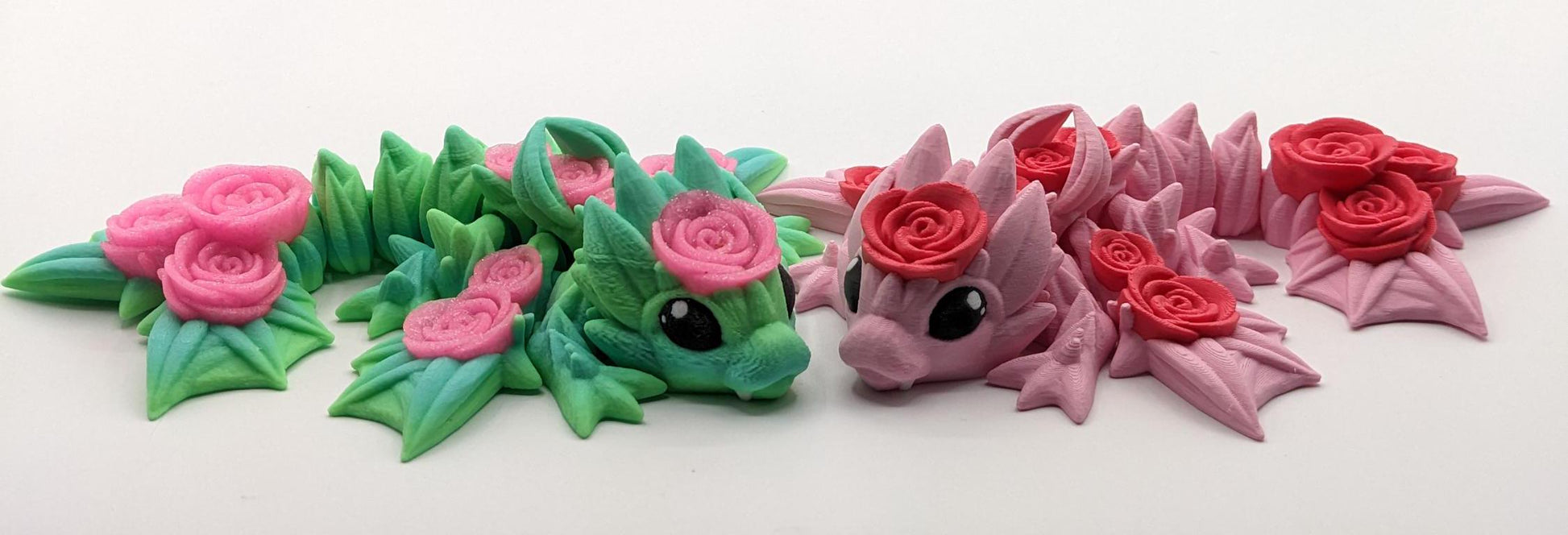 Add a touch of magic and charm to your day with the Adorable Articulated Baby Rose Dragon Fidget Toy! This enchanting 3D-printed dragon is inspired by the beauty of roses and the whimsical allure of baby dragons. The perfect Valentine's gift.