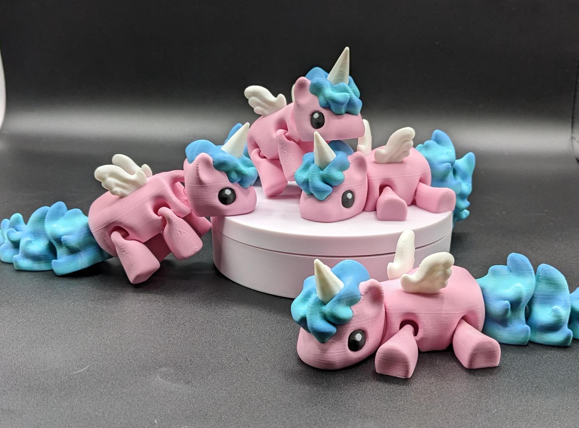 Our Magical Articulated Baby Unicorn Fidget Toy is perfect for fidgeting, imaginative play, or as a whimsical desk accessory. The perfect gift for the unicorn lover in your life or gift for yourself!