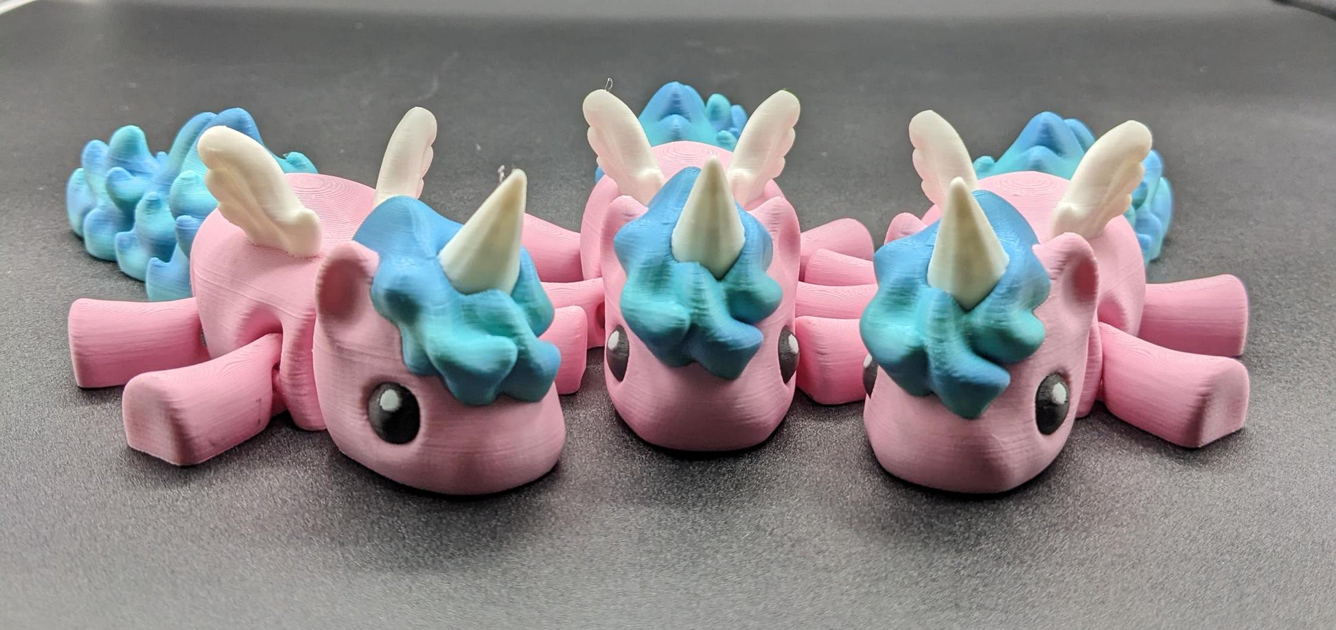 Our Magical Articulated Baby Unicorn Fidget Toy is perfect for fidgeting, imaginative play, or as a whimsical desk accessory. The perfect gift for the unicorn lover in your life or gift for yourself!