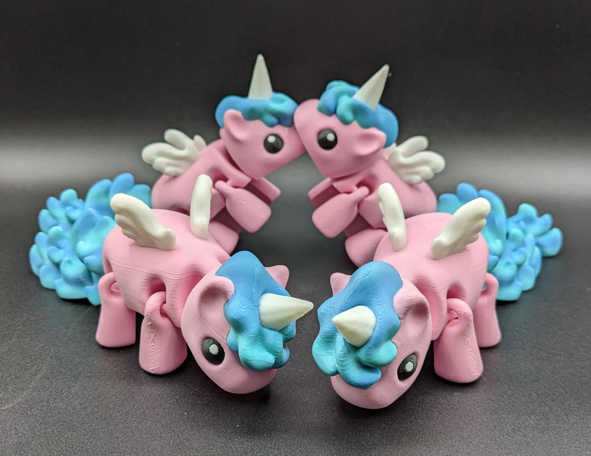 Our Magical Articulated Baby Unicorn Fidget Toy is perfect for fidgeting, imaginative play, or as a whimsical desk accessory. The perfect gift for the unicorn lover in your life or gift for yourself!