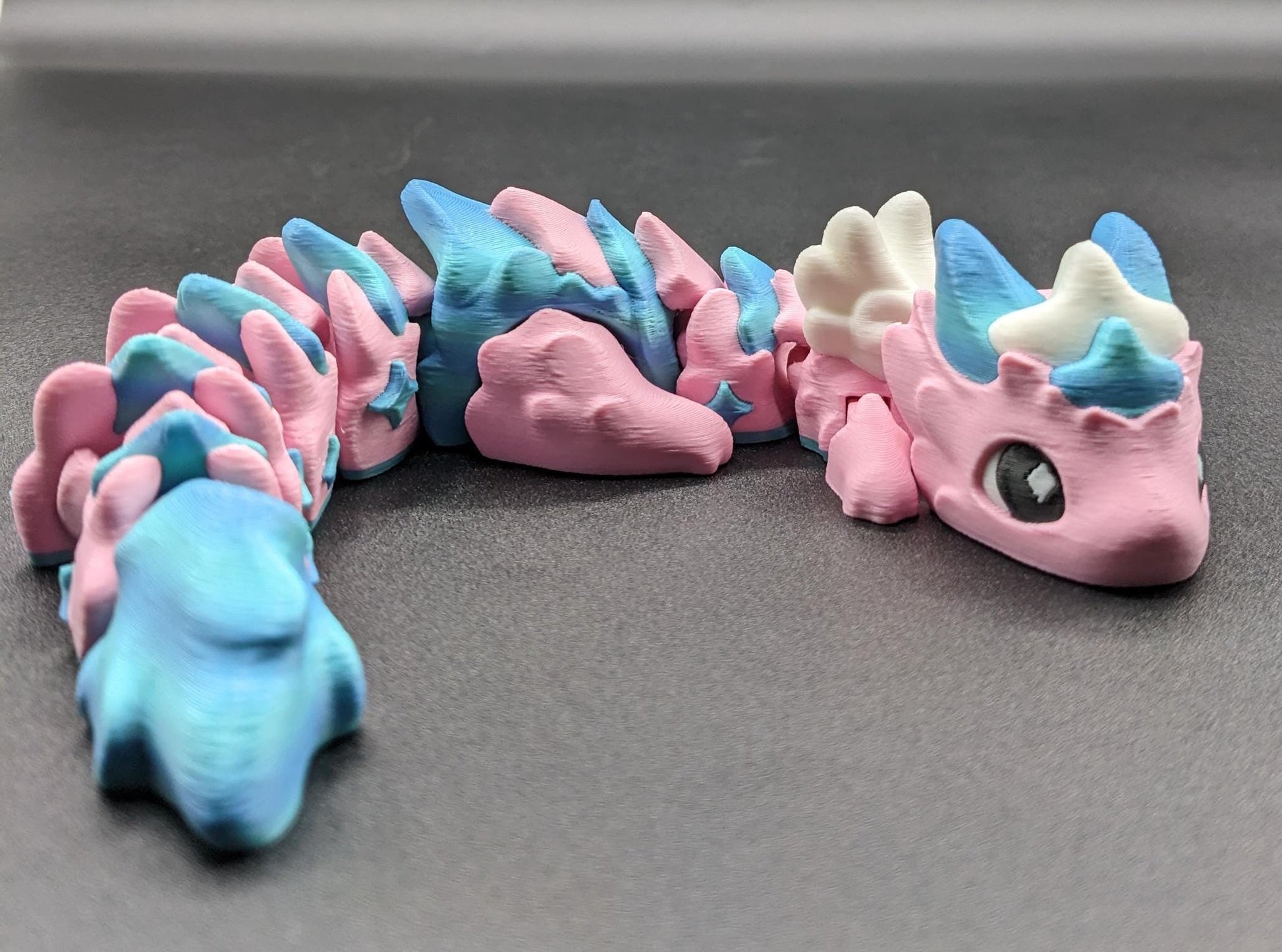 Our Sweet Articulated Baby Atria Fidget Toy is a delightful & interactive creation designed to bring joy, creativity, & stress relief into your life! Our fidget toy features a unique & sweet design making it perfect for fidgeting &  imaginative play.