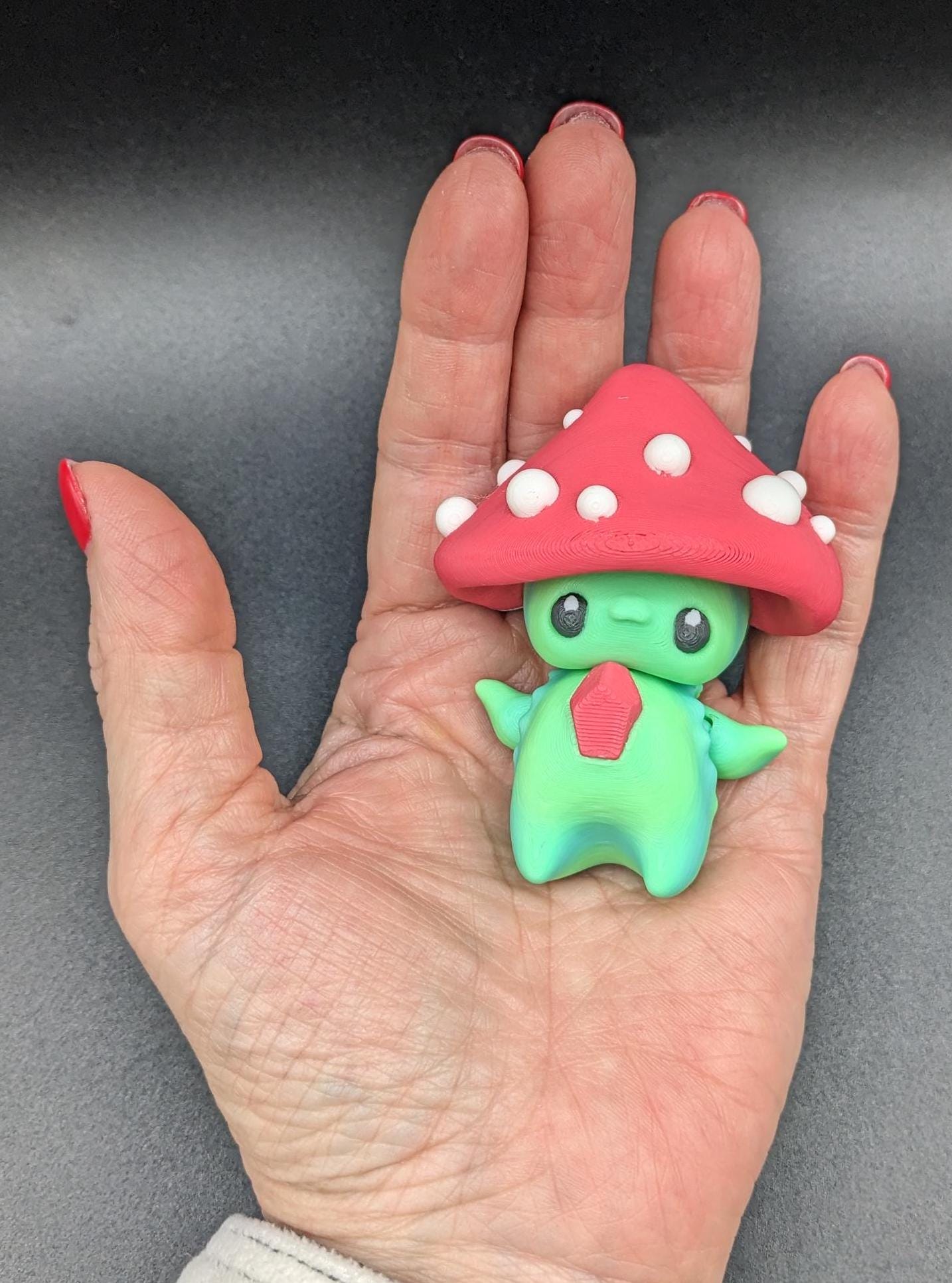 Our Mischievous Articulated Mushroom Pixies are designed with fully articulated joints, making this Mushroom Pixie perfect for fidgeting, imaginative play, or adding a touch of mischief to your desk or shelf decor.