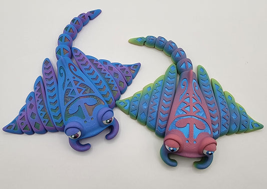Meet our adorable 3D Printed Tribal Tattooed Manta Ray Fidget Toy – your companion for stress relief and endless fun! Crafted with precision, this Tattooed Manta Ray is more than just a toy; it's a delightful escape from the daily hustle.