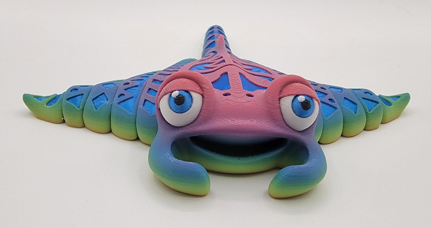 Meet our adorable 3D Printed Tribal Tattooed Manta Ray Fidget Toy – your companion for stress relief and endless fun! Crafted with precision, this Tattooed Manta Ray is more than just a toy; it's a delightful escape from the daily hustle.
