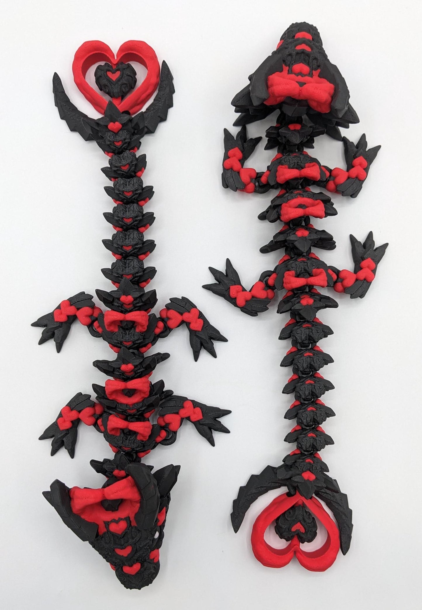 Meet the Elegant Articulated Baby Dark Heart Dragon, a stunning blend of mystery, grace, and intricate design. This captivating 3D-printed dragon is perfect for dragon enthusiasts, collectors, or anyone who loves unique and magical creations.