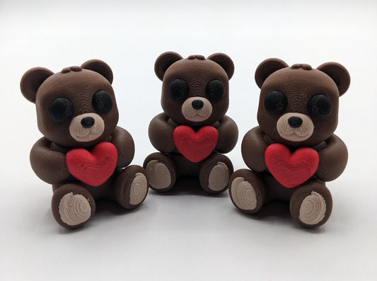 Meet our Adorable Articulated Baby Heart Bear—a delightful 3D-printed fidget toy that’s as cute as it is fun! The perfect Valentine's Day gift!  Perfect for fidgeting, imaginative play, gift giving, or as a charming collectible.