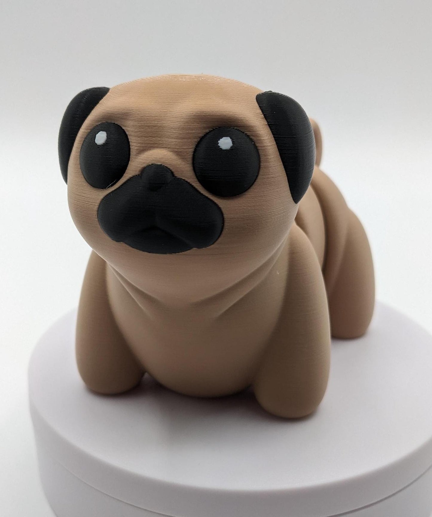 Man's best friend & the clown of the dog breeds, our adorable pug with it's larger size makes it even more fun to handle, while capturing the mischievous charm of your puggy friend. Whether you’re looking for a unique gift, a relaxing fidget toy, or a playful decoration, this pug puppy will bring endless joy & stress relief.