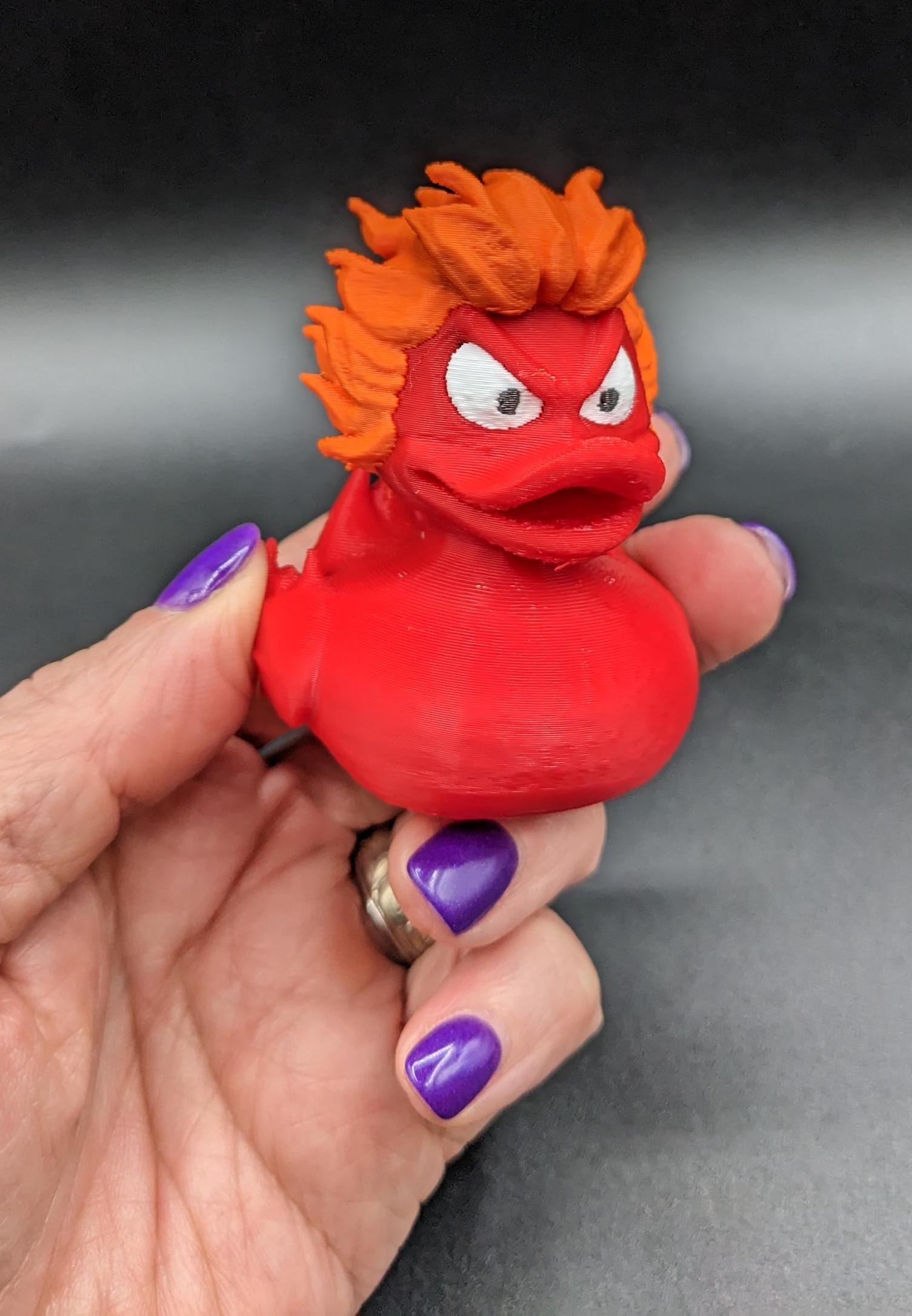 Our fiery duck combines a fierce design with playful charm, making it the perfect gift for the Jeep duck collectors, fidget toy enthusiasts, or anyone looking to add a spark to their decor. With its vibrant fiery colors and detailed craftsmanship, this duck is a true standout.