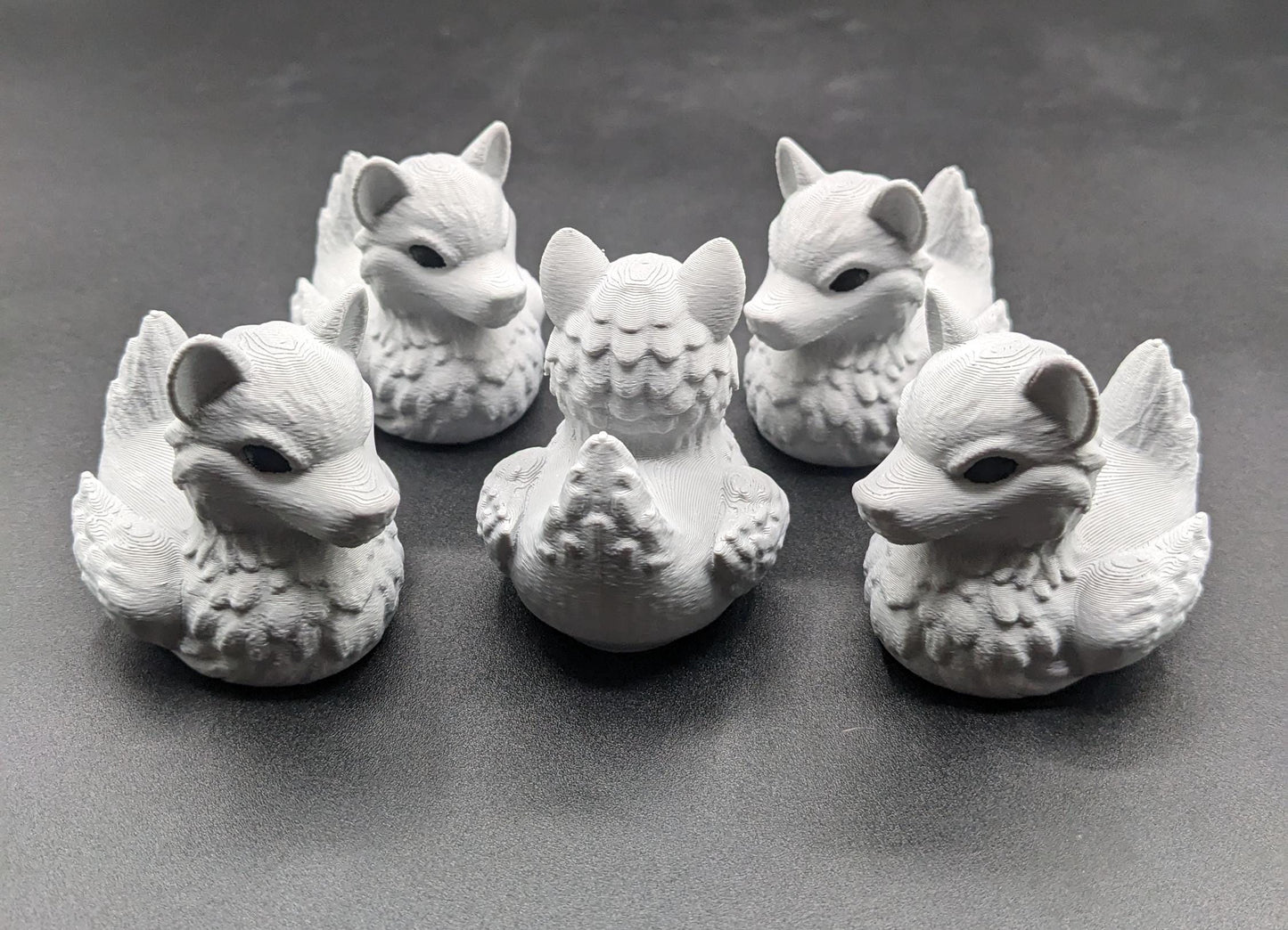 Meet our newest member of our duck family, the Gray Wolf Duck! Whether you’re a fan of wolves, ducks, Jeep Duck Collector, or quirky decor, this hybrid figurine is the ultimate conversation starter. Designed with intricate details makes this loyal and unique creation makes the perfect gift for animal lovers, Jeep duck collectors, or anyone who appreciates imaginative designs.