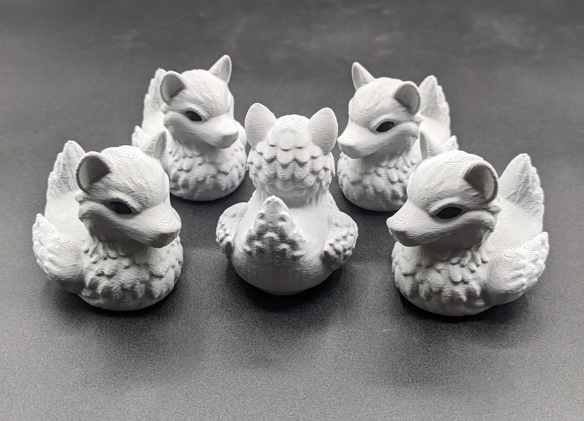 Meet our newest member of our duck family, the Gray Wolf Duck! Whether you’re a fan of wolves, ducks, Jeep Duck Collector, or quirky decor, this hybrid figurine is the ultimate conversation starter. Designed with intricate details makes this loyal and unique creation makes the perfect gift for animal lovers, Jeep duck collectors, or anyone who appreciates imaginative designs.