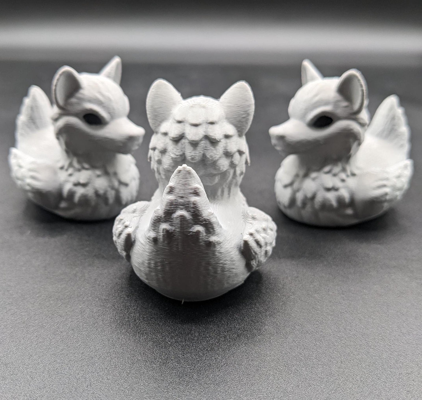 Meet our newest member of our duck family, the Gray Wolf Duck! Whether you’re a fan of wolves, ducks, Jeep Duck Collector, or quirky decor, this hybrid figurine is the ultimate conversation starter. Designed with intricate details makes this loyal and unique creation makes the perfect gift for animal lovers, Jeep duck collectors, or anyone who appreciates imaginative designs.