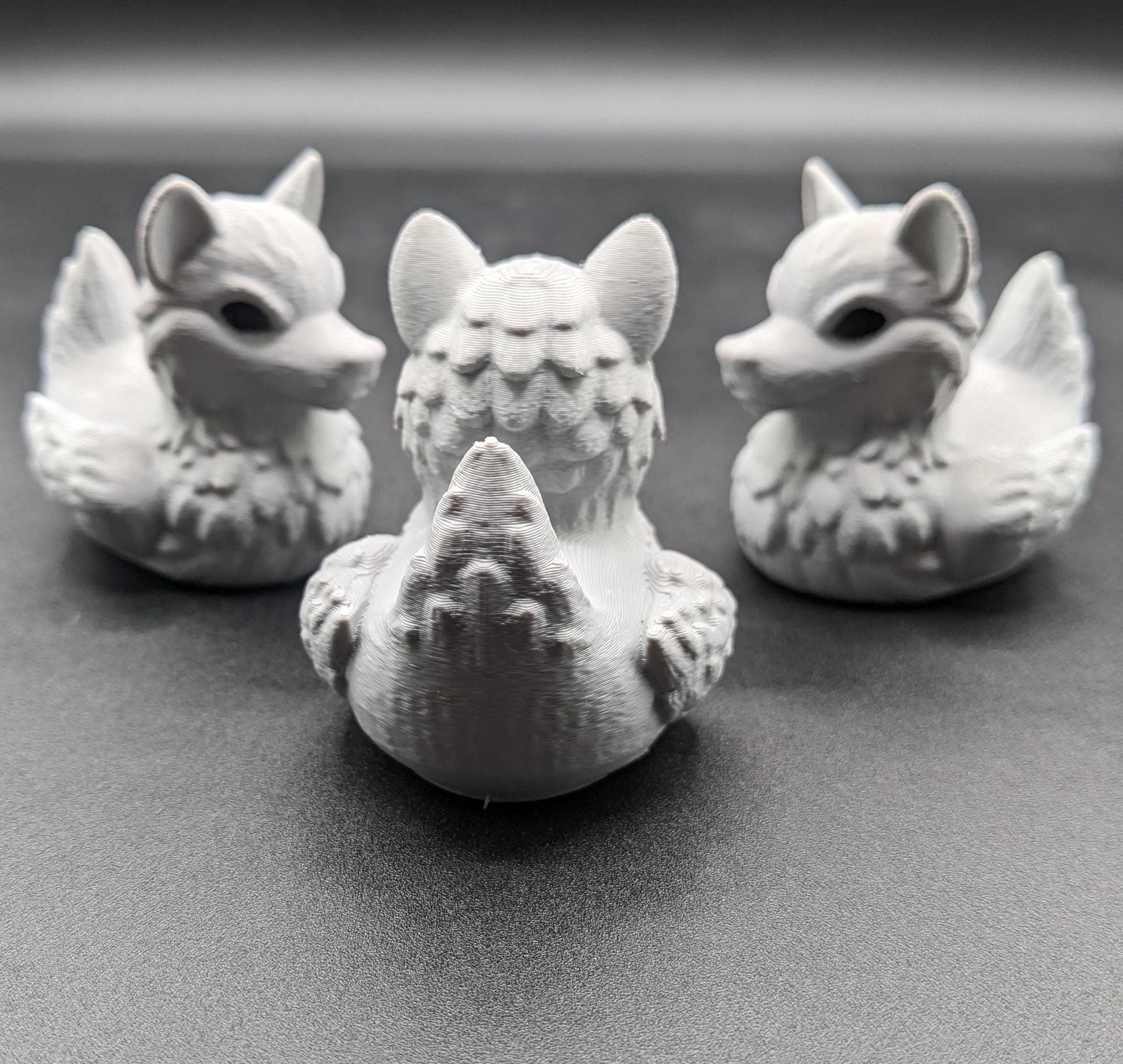 Meet our newest member of our duck family, the Gray Wolf Duck! Whether you’re a fan of wolves, ducks, Jeep Duck Collector, or quirky decor, this hybrid figurine is the ultimate conversation starter. Designed with intricate details makes this loyal and unique creation makes the perfect gift for animal lovers, Jeep duck collectors, or anyone who appreciates imaginative designs.