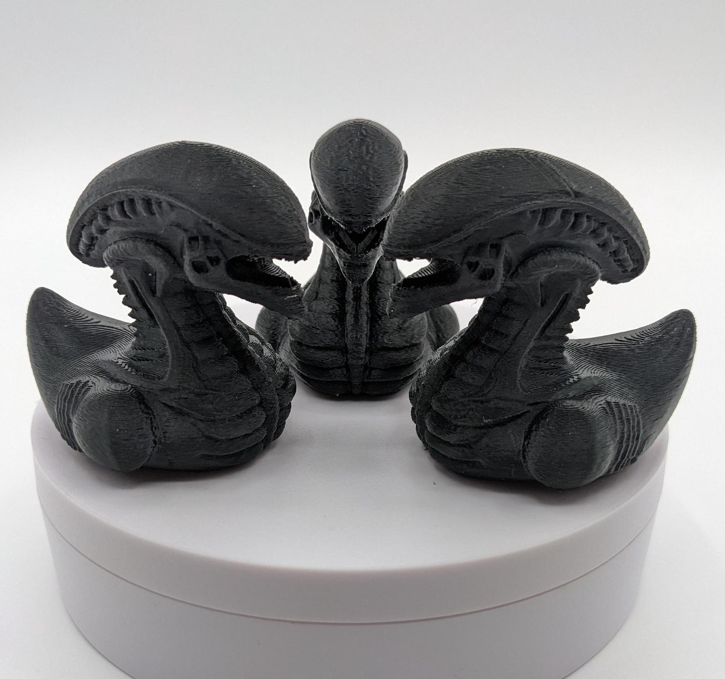 Step into the world of sci-fi and whimsy with the Alien Xenomorph Duck! This one-of-a-kind 3D-printed creation combines the eerie, iconic design of an alien xenomorph with the playful charm of a duck. Perfect for fans of alien creatures, sci-fi enthusiasts, Jeep duck collectors, or anyone who loves quirky collectibles, this hybrid figurine is sure to stand out in any collection.