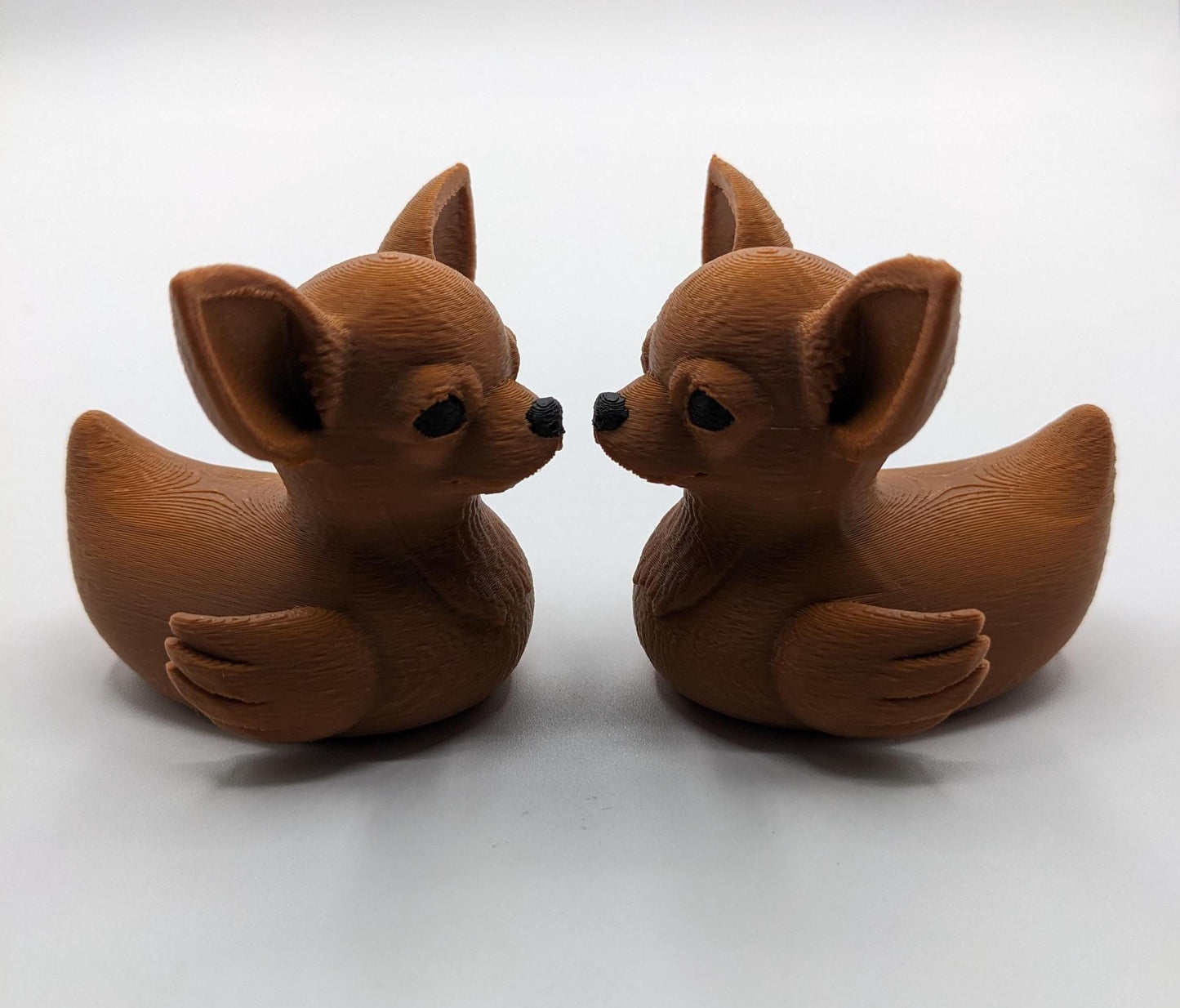 Meet the Cute Chihuahua Duck, a delightful and quirky 3D-printed hybrid figurine that combines the sassy charm of a Chihuahua with the playful personality of a duck! This adorable design is perfect for dog lovers, Chihuahua fans, Jeep duck collectors, or anyone who loves unique and creative decor. Whether perched on your desk, Jeep dash, displayed on a shelf, or given as a memorable gift, this Chihuahua Duck is guaranteed to bring joy and start conversations.