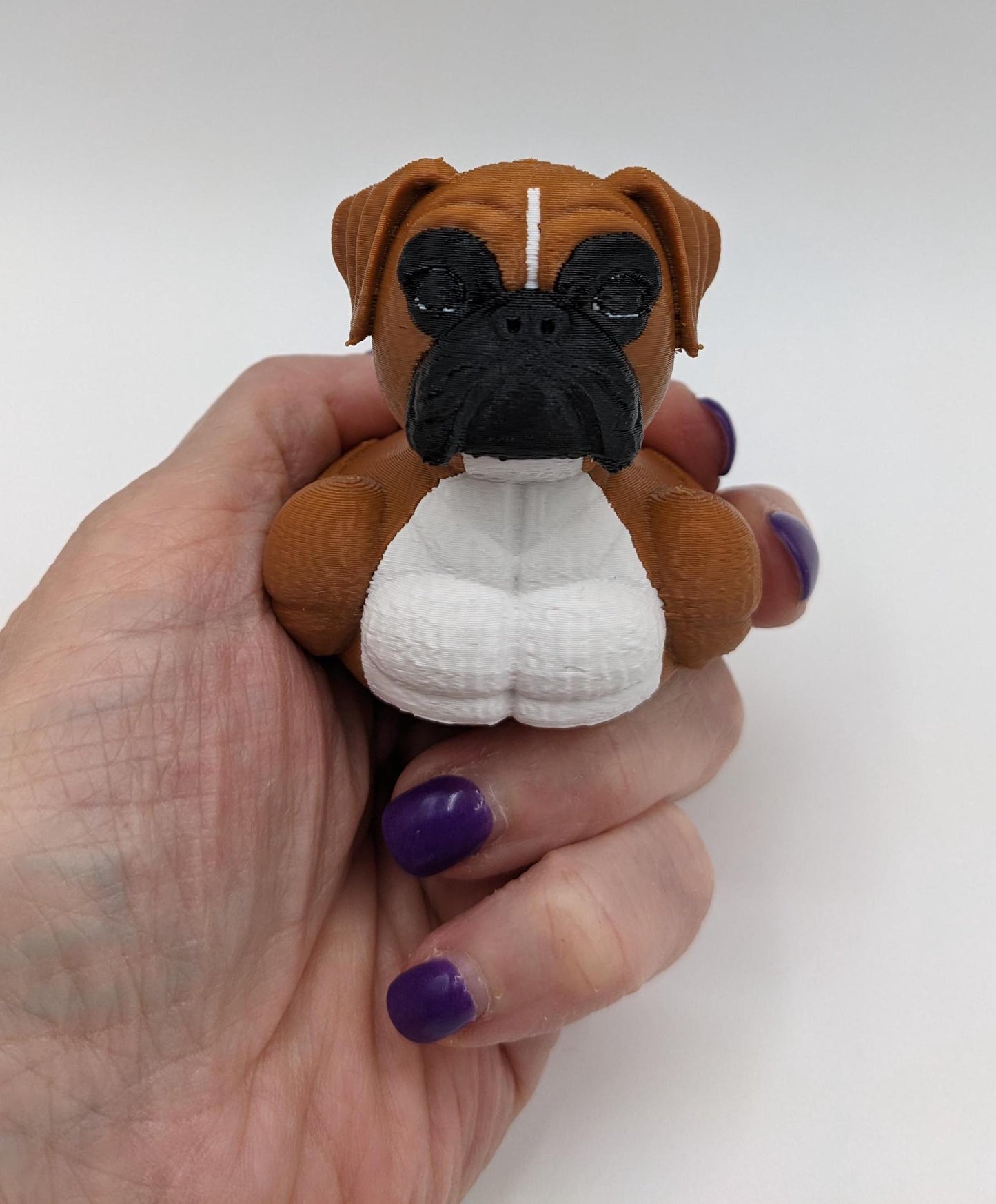 Meet The Magnificent Boxer Duck, a creative and charming 3D-printed hybrid that combines the strong, playful personality of a Boxer dog with the whimsical charm of a duck! This one-of-a-kind figurine is perfect for Boxer lovers, dog enthusiasts, Jeep duck collectors, or anyone who enjoys quirky and imaginative decor. Whether displayed on a shelf, a Jeep dash, added to your collection, or given as a thoughtful gift, this Boxer Duck is guaranteed to bring smiles and brighten up any room.