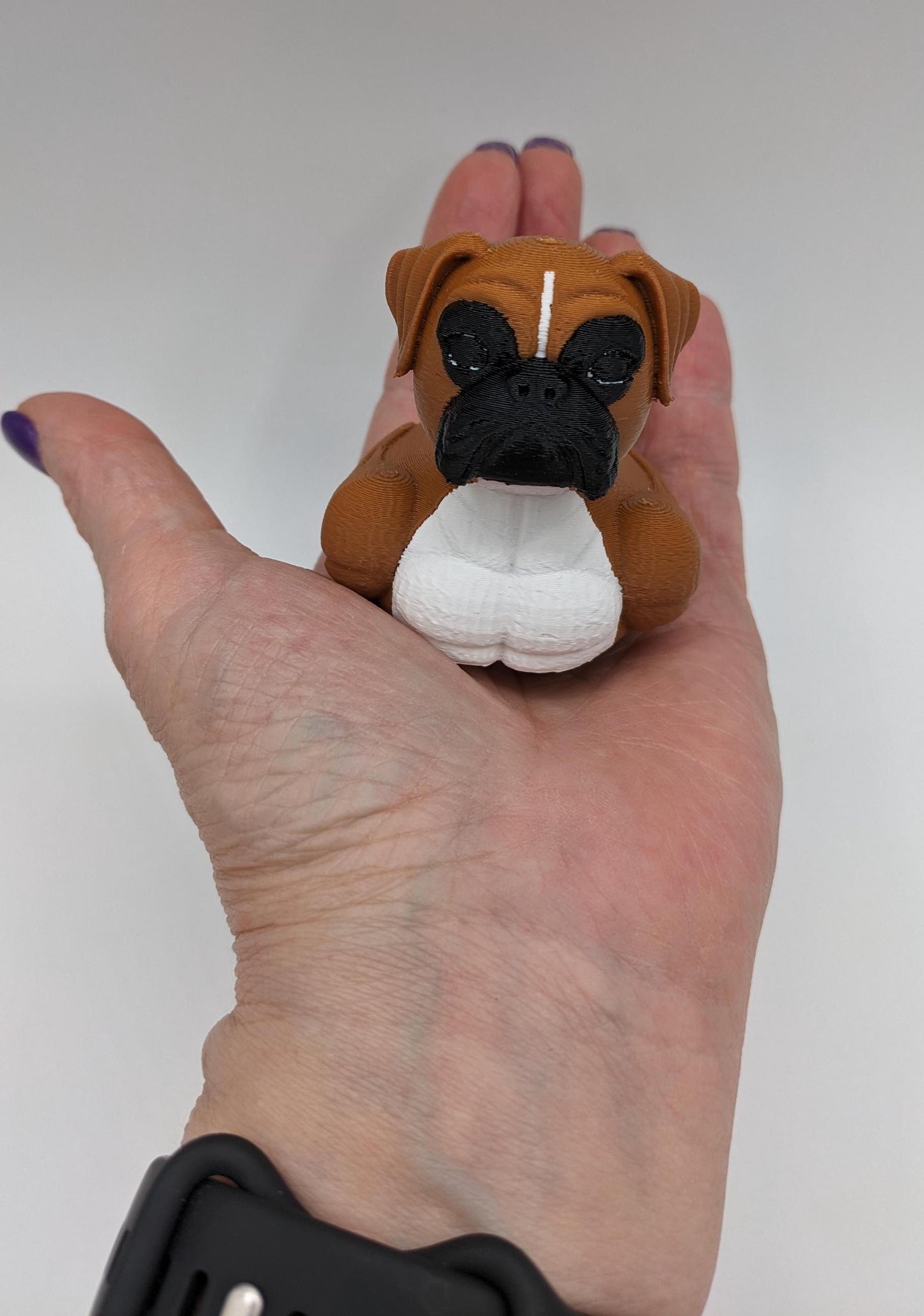 Meet The Magnificent Boxer Duck, a creative and charming 3D-printed hybrid that combines the strong, playful personality of a Boxer dog with the whimsical charm of a duck! This one-of-a-kind figurine is perfect for Boxer lovers, dog enthusiasts, Jeep duck collectors, or anyone who enjoys quirky and imaginative decor. Whether displayed on a shelf, a Jeep dash, added to your collection, or given as a thoughtful gift, this Boxer Duck is guaranteed to bring smiles and brighten up any room.
