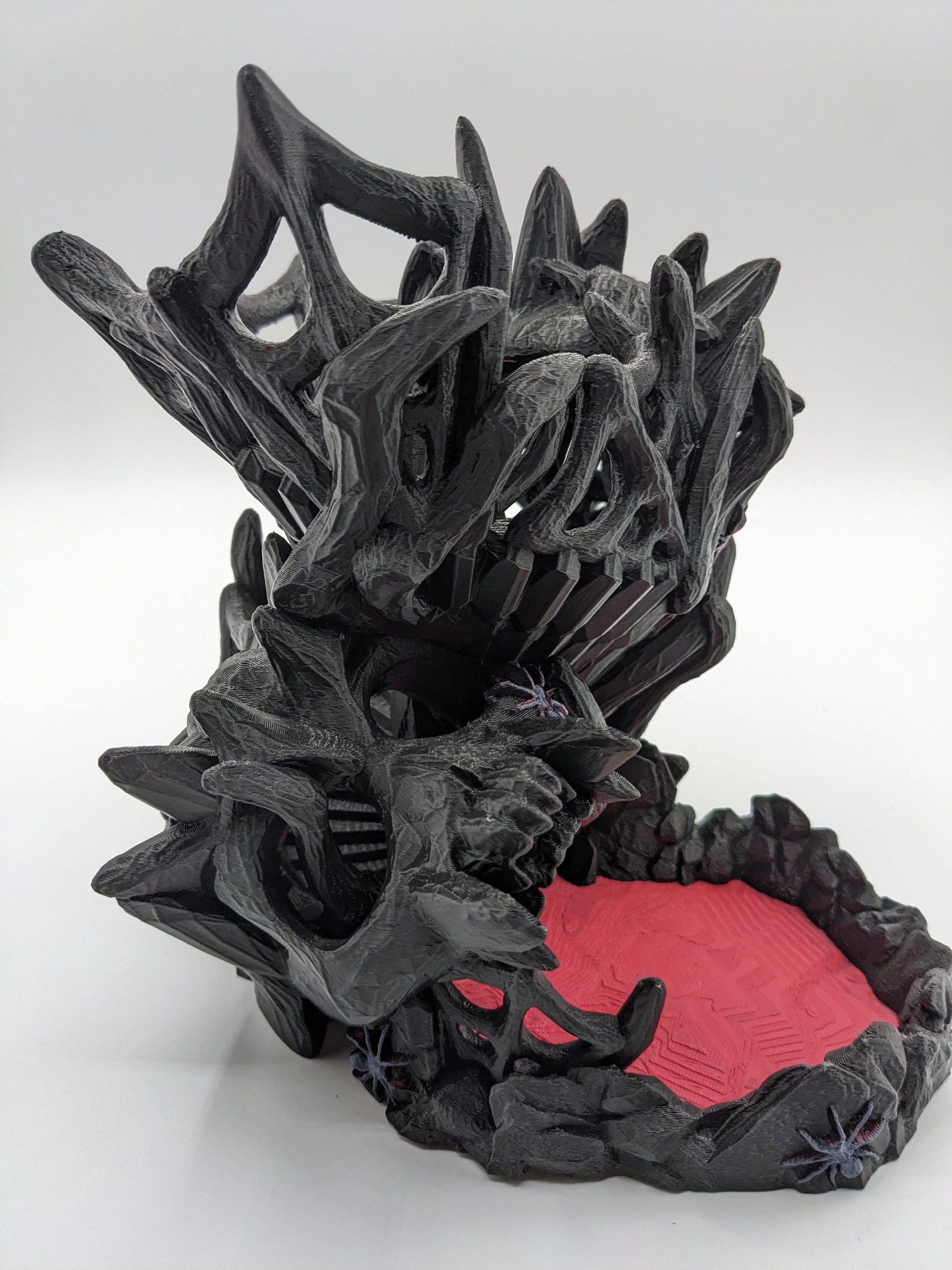 Handcrafted with eerie detail, this 3D printed dice tower combines functionality with a touch of the macabre, making it the perfect addition to any tabletop game. Whether you're a seasoned gamer or a newcomer, this spooky accessory is designed to enhance your gameplay with a chilling twist.