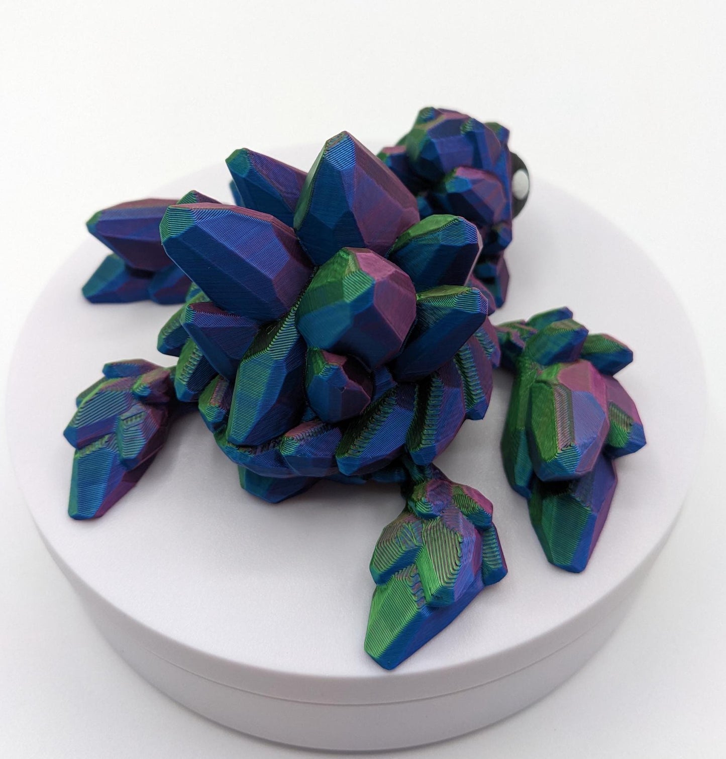 Welcome to our enchanting world of 3D Printed Gemstone Turtles! Elevate your home decor with this exquisite handcrafted sculpture that seamlessly blends artistry with nature's beauty. Our unique turtle design captures the essence of tranquility, making it a perfect addition to any space.