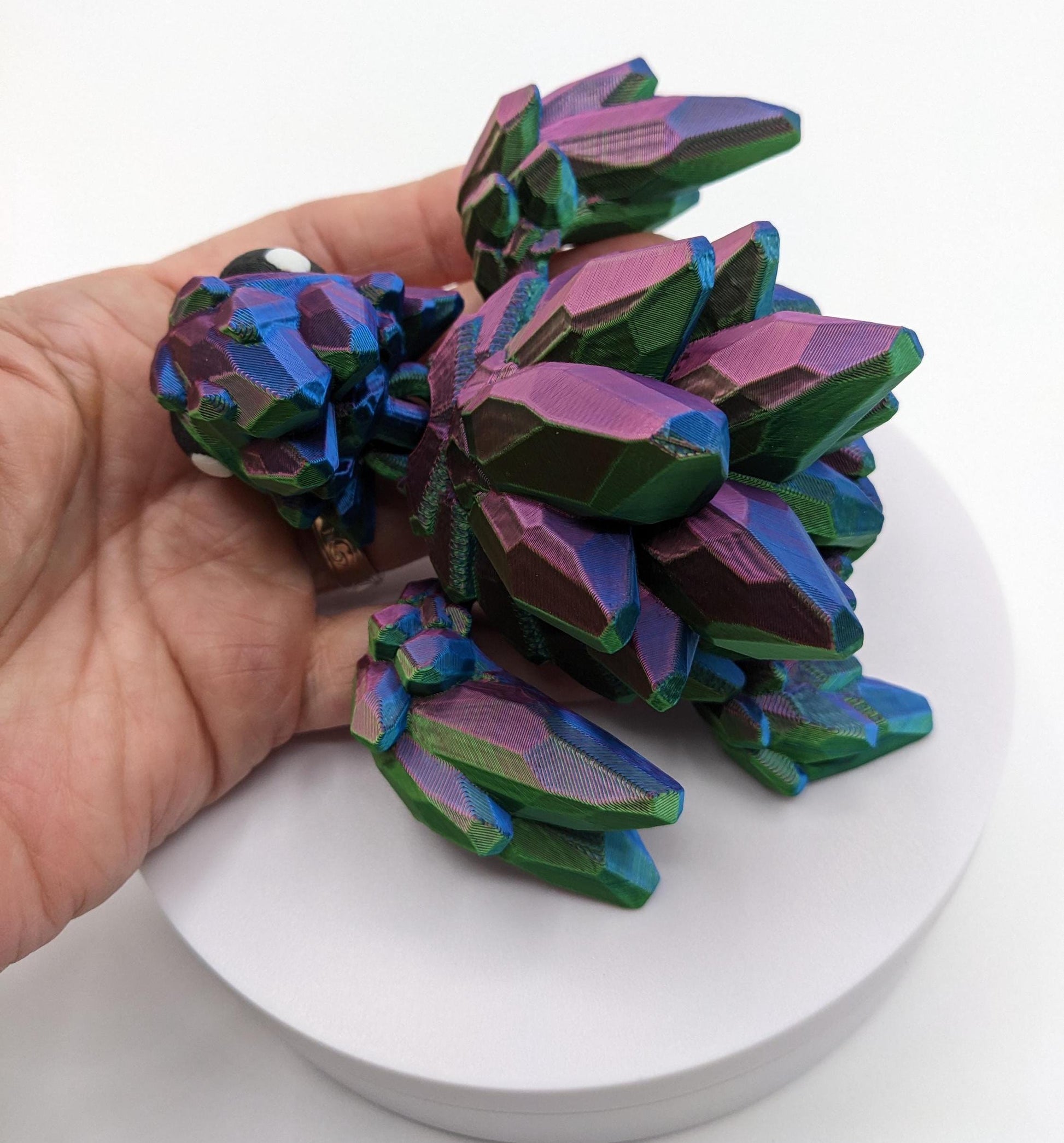 Welcome to our enchanting world of 3D Printed Gemstone Turtles! Elevate your home decor with this exquisite handcrafted sculpture that seamlessly blends artistry with nature's beauty. Our unique turtle design captures the essence of tranquility, making it a perfect addition to any space.