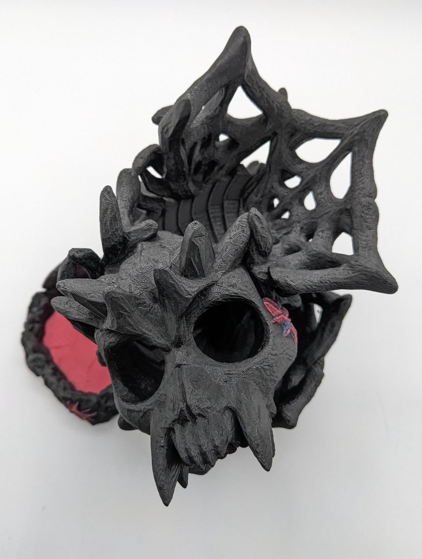 Handcrafted with eerie detail, this 3D printed dice tower combines functionality with a touch of the macabre, making it the perfect addition to any tabletop game. Whether you're a seasoned gamer or a newcomer, this spooky accessory is designed to enhance your gameplay with a chilling twist.