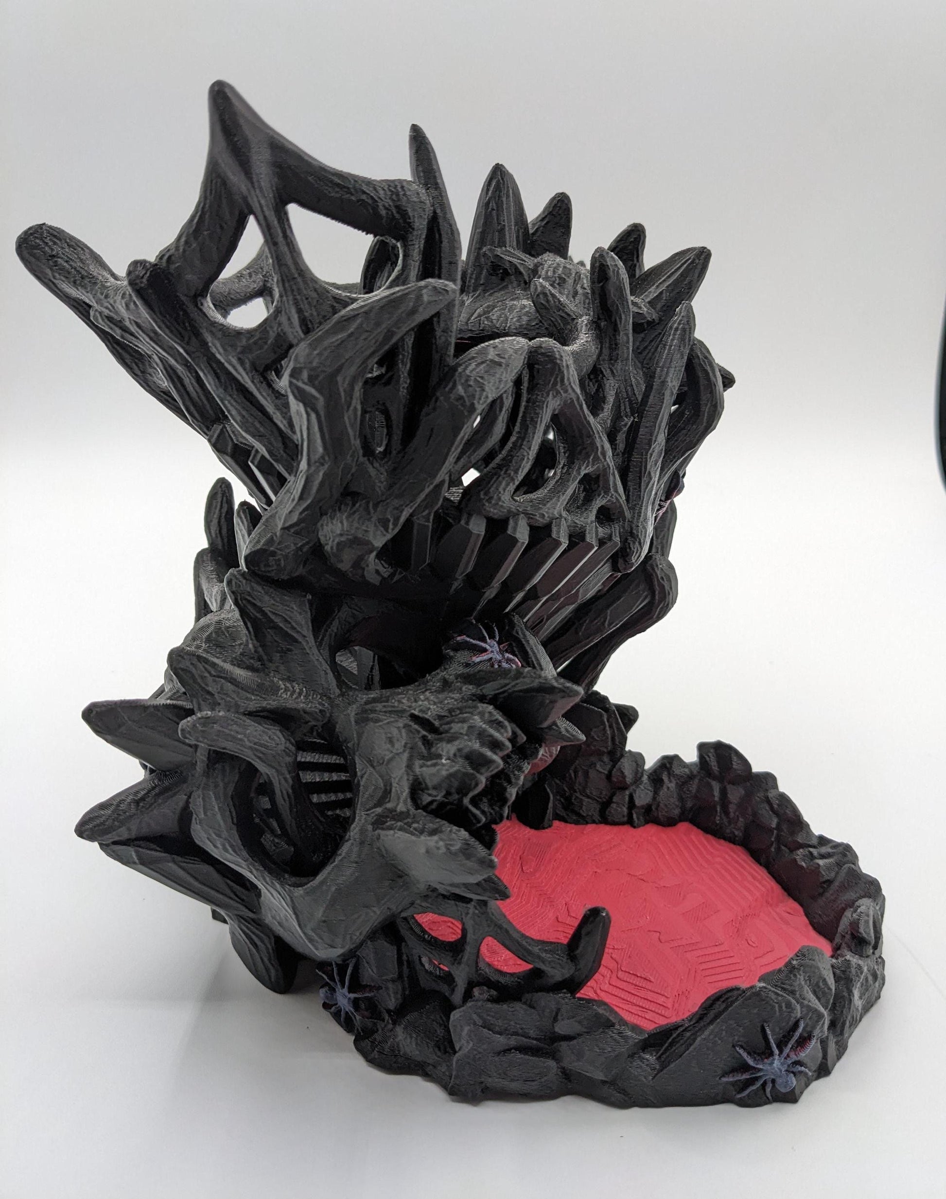 Handcrafted with eerie detail, this 3D printed dice tower combines functionality with a touch of the macabre, making it the perfect addition to any tabletop game. Whether you're a seasoned gamer or a newcomer, this spooky accessory is designed to enhance your gameplay with a chilling twist.