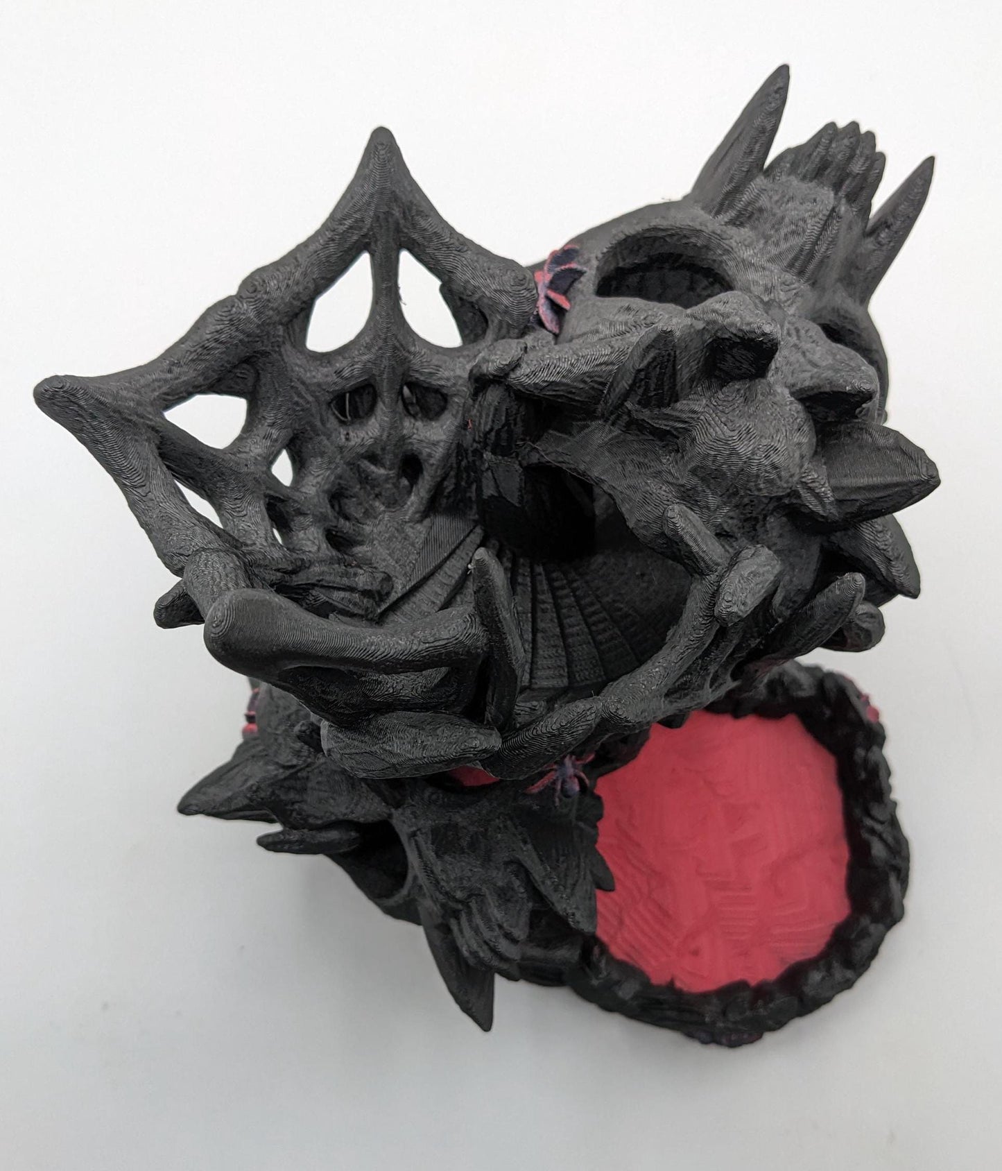 Handcrafted with eerie detail, this 3D printed dice tower combines functionality with a touch of the macabre, making it the perfect addition to any tabletop game. Whether you're a seasoned gamer or a newcomer, this spooky accessory is designed to enhance your gameplay with a chilling twist.