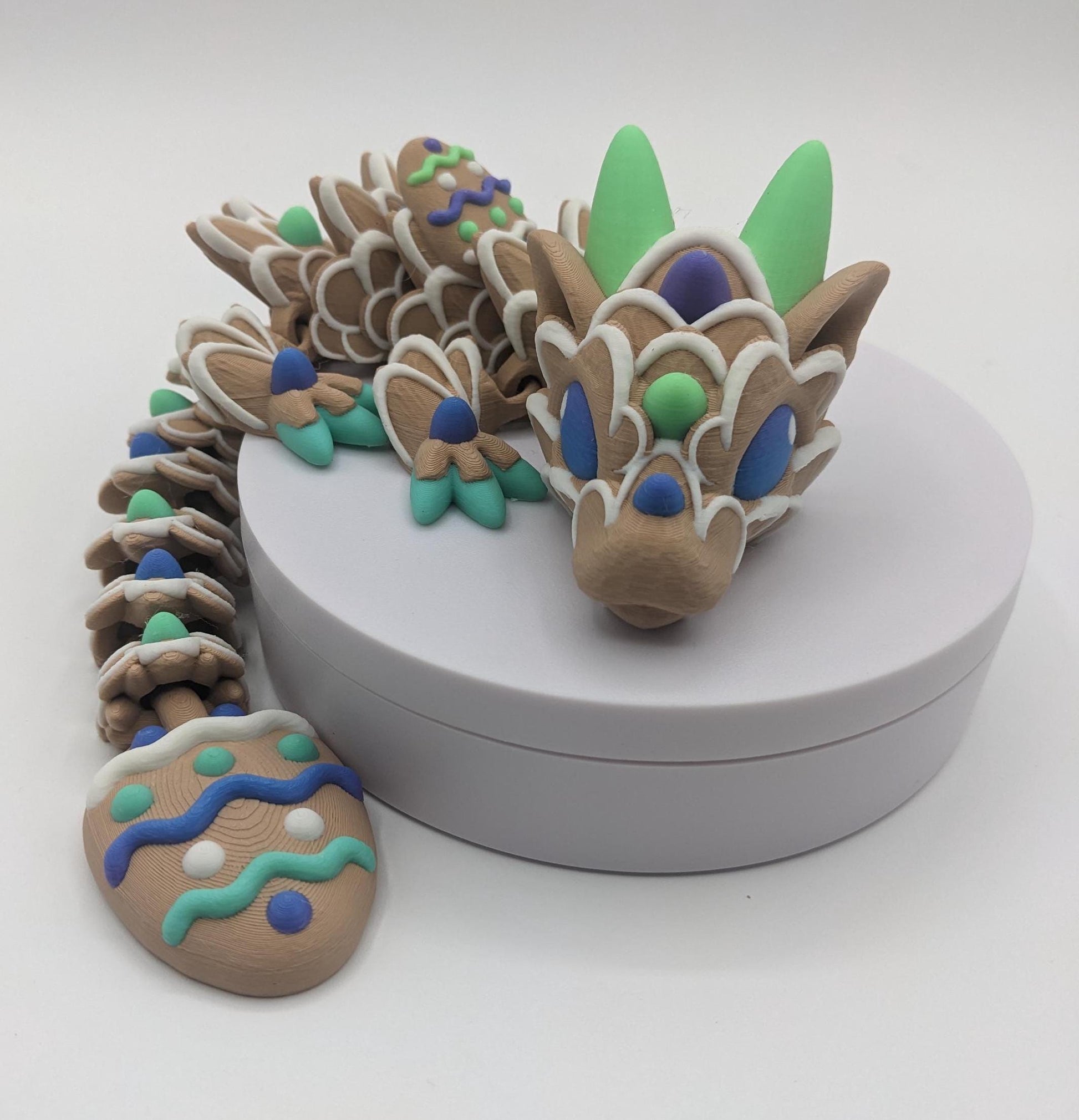 Add a touch of magic and festivity to your Easter celebration with The Beautiful Easter Egg Cookie Dragon! Whether you’re looking for a unique seasonal decor piece, a thoughtful gift, or a whimsical addition to your fantasy collection, this dragon is sure to make a statement. Compact, durable, and eco-friendly, it’s the perfect way to celebrate spring in style.