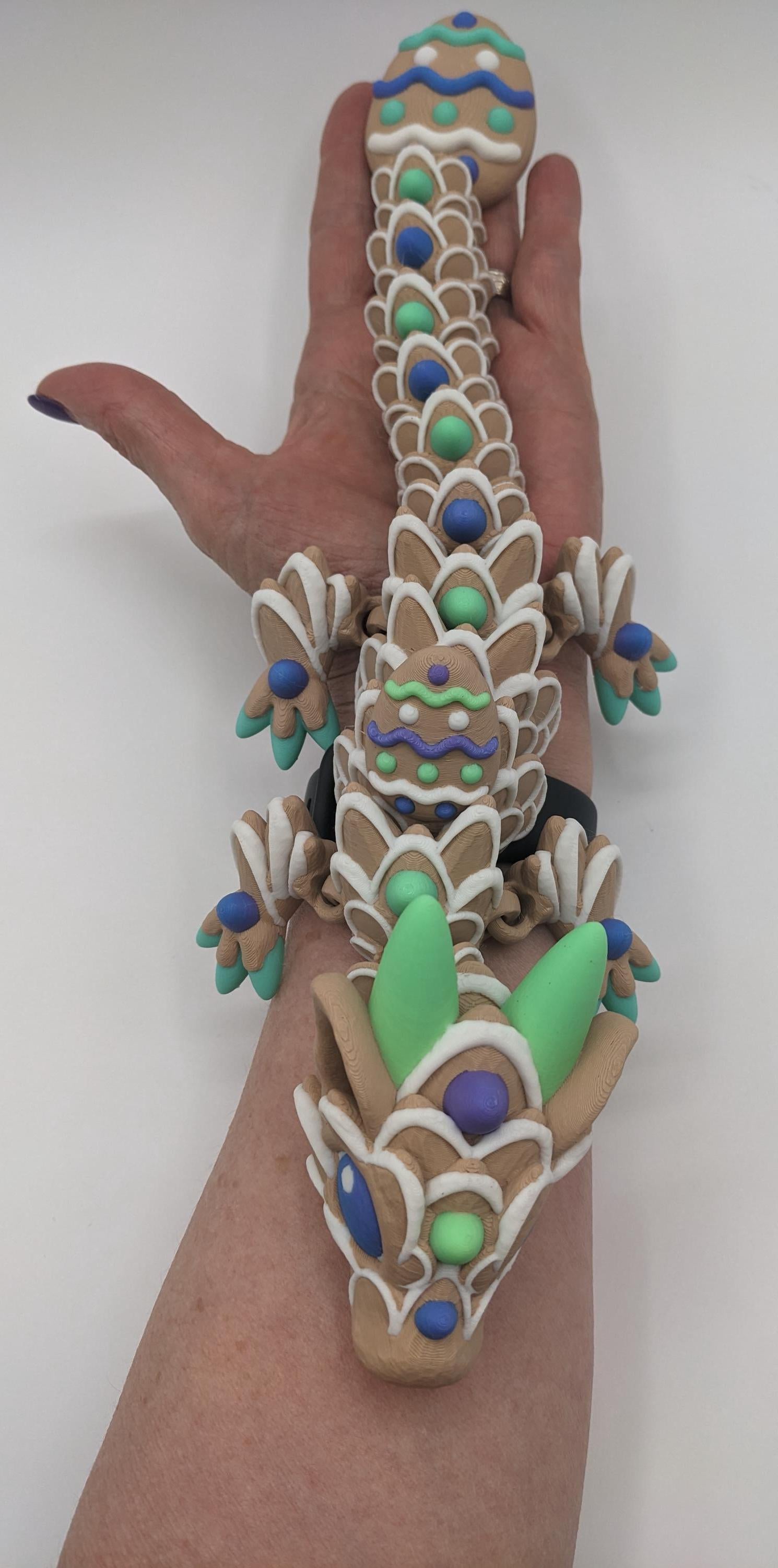 Add a touch of magic and festivity to your Easter celebration with The Beautiful Easter Egg Cookie Dragon! Whether you’re looking for a unique seasonal decor piece, a thoughtful gift, or a whimsical addition to your fantasy collection, this dragon is sure to make a statement. Compact, durable, and eco-friendly, it’s the perfect way to celebrate spring in style.