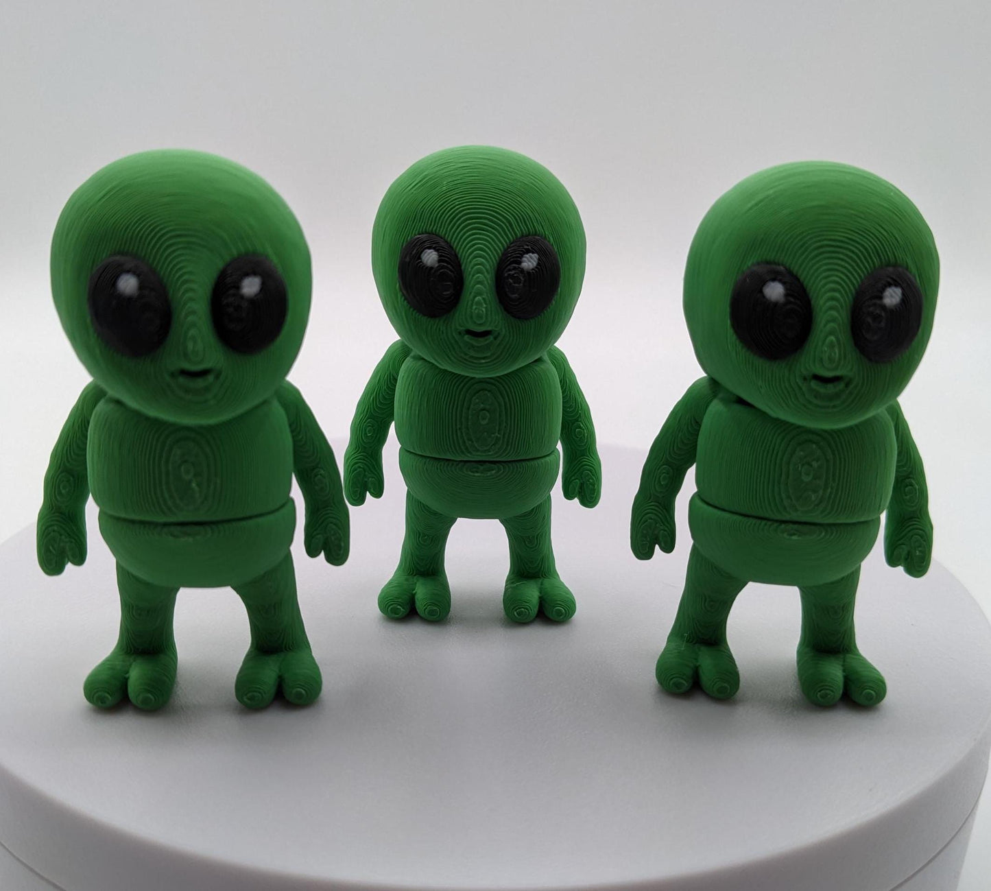 Say hello to the Tiny Alien Fidget Toy, a fun and quirky companion thatâs out of this world! This 3D-printed alien is designed for fidgeting, stress relief, and endless entertainment. Its compact size makes it perfect to carry in your pocket, and its unique design is sure to spark smiles wherever you go. Whether youâre looking for a fun desk toy, a creative gift, or a unique collectible, this tiny alien is a must-have!