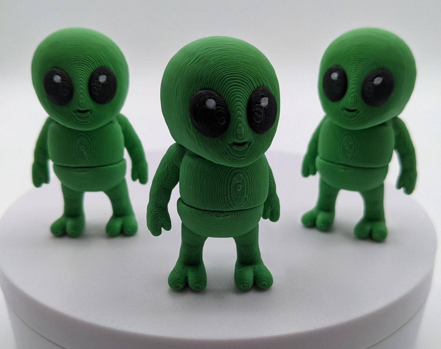 Say hello to the Tiny Alien Fidget Toy, a fun and quirky companion thatâs out of this world! This 3D-printed alien is designed for fidgeting, stress relief, and endless entertainment. Its compact size makes it perfect to carry in your pocket, and its unique design is sure to spark smiles wherever you go. Whether youâre looking for a fun desk toy, a creative gift, or a unique collectible, this tiny alien is a must-have!
