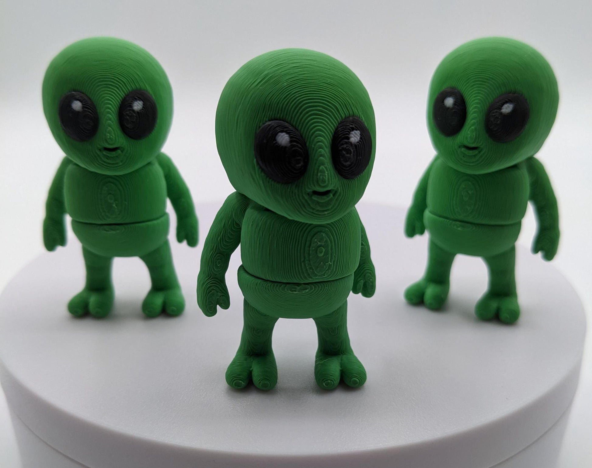 Say hello to the Tiny Alien Fidget Toy, a fun and quirky companion thatâs out of this world! This 3D-printed alien is designed for fidgeting, stress relief, and endless entertainment. Its compact size makes it perfect to carry in your pocket, and its unique design is sure to spark smiles wherever you go. Whether youâre looking for a fun desk toy, a creative gift, or a unique collectible, this tiny alien is a must-have!