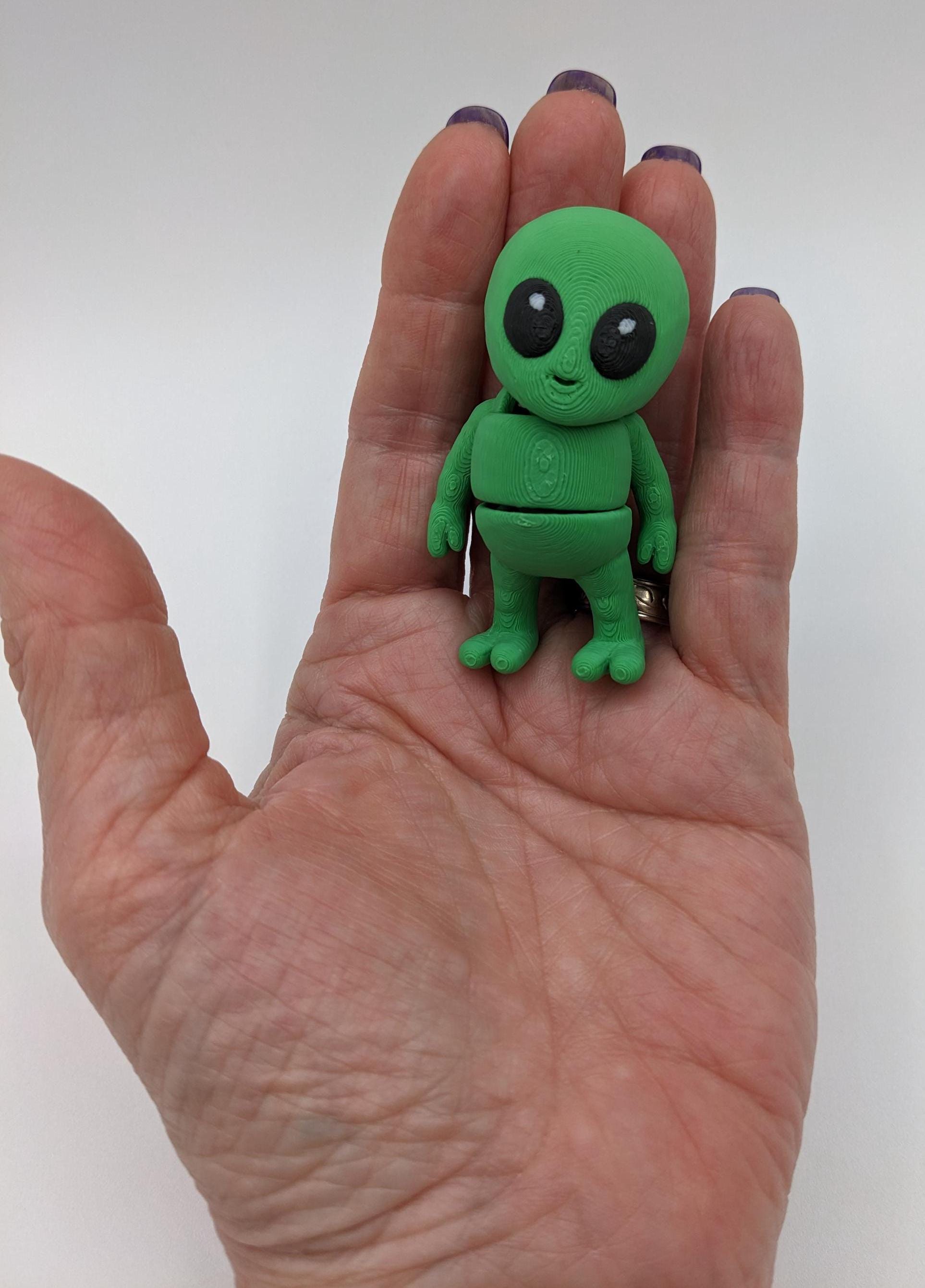 Say hello to the Tiny Alien Fidget Toy, a fun and quirky companion thatâs out of this world! This 3D-printed alien is designed for fidgeting, stress relief, and endless entertainment. Its compact size makes it perfect to carry in your pocket, and its unique design is sure to spark smiles wherever you go. Whether youâre looking for a fun desk toy, a creative gift, or a unique collectible, this tiny alien is a must-have!