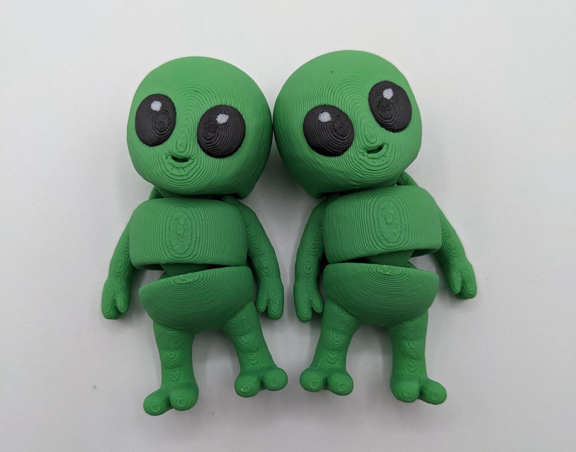 Say hello to the Tiny Alien Fidget Toy, a fun and quirky companion thatâs out of this world! This 3D-printed alien is designed for fidgeting, stress relief, and endless entertainment. Its compact size makes it perfect to carry in your pocket, and its unique design is sure to spark smiles wherever you go. Whether youâre looking for a fun desk toy, a creative gift, or a unique collectible, this tiny alien is a must-have!