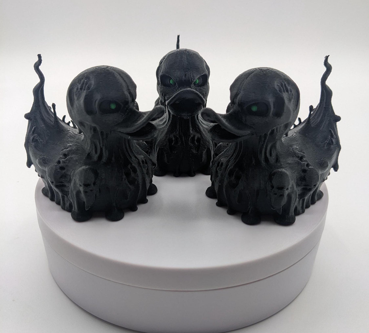 Meet our Scary Evil Spirit Duck, a spooky, quirky 3D-printed, (not painted), creation combining a classic duck with a haunting twist. It's creepy design & eerie features, this duck is perfect for Halloween decor, horror enthusiasts, Jeep duck collectors, or anyone who loves  spooky collectibles. Whether displayed on the dash of your Jeep, perched on your shelf, added to your haunted decorations, or gifted to a lover of the macabre, this evil spirit duck is guaranteed to make a scary statement!