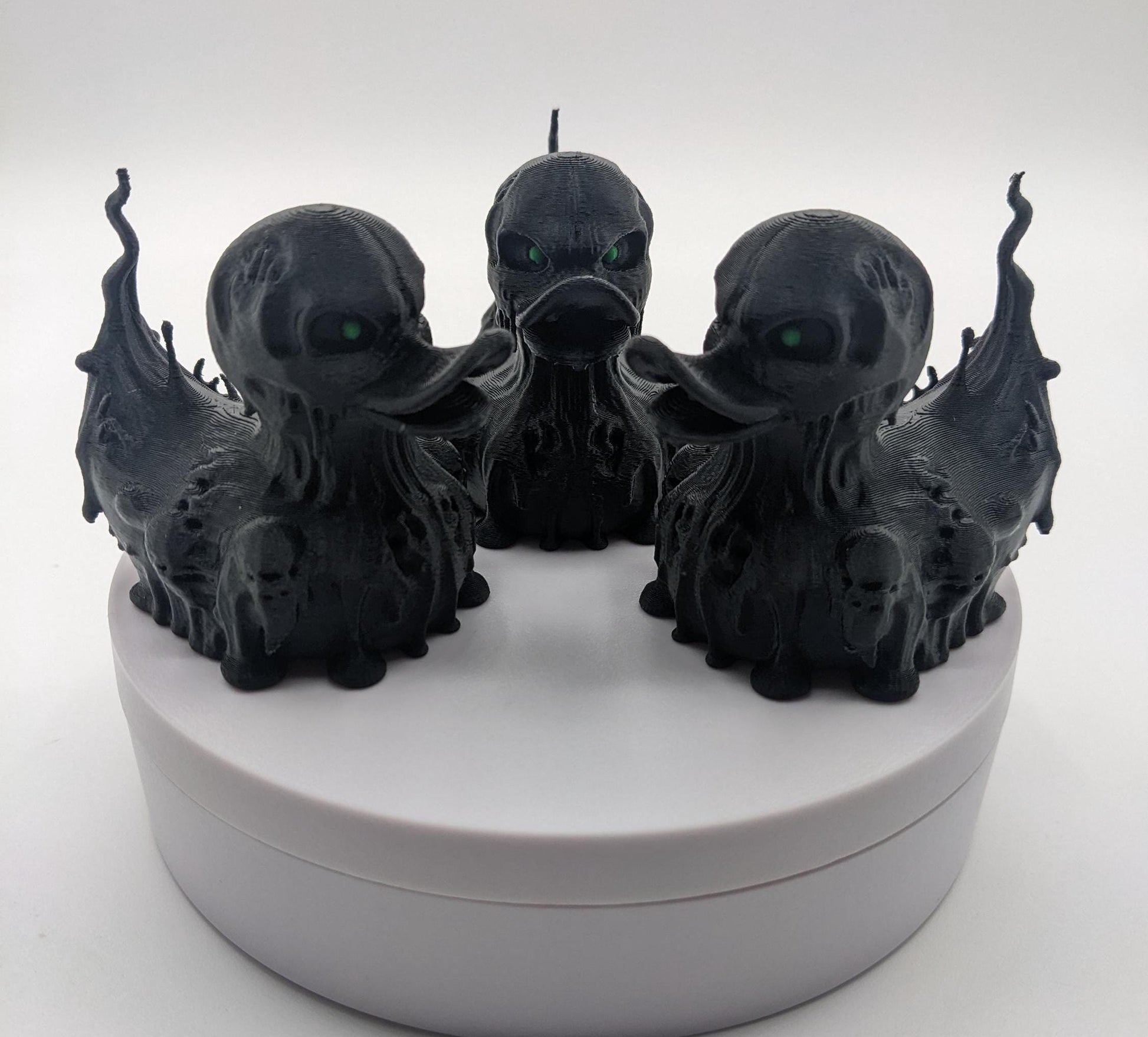 Meet our Scary Evil Spirit Duck, a spooky, quirky 3D-printed, (not painted), creation combining a classic duck with a haunting twist. It's creepy design & eerie features, this duck is perfect for Halloween decor, horror enthusiasts, Jeep duck collectors, or anyone who loves  spooky collectibles. Whether displayed on the dash of your Jeep, perched on your shelf, added to your haunted decorations, or gifted to a lover of the macabre, this evil spirit duck is guaranteed to make a scary statement!
