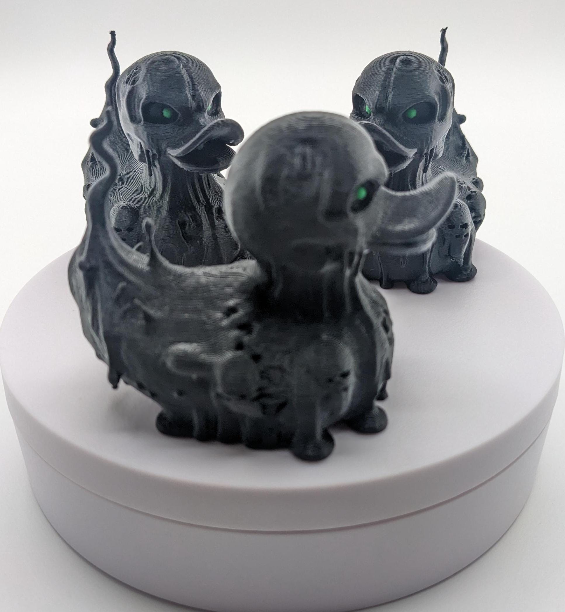 Meet our Scary Evil Spirit Duck, a spooky, quirky 3D-printed, (not painted), creation combining a classic duck with a haunting twist. It's creepy design & eerie features, this duck is perfect for Halloween decor, horror enthusiasts, Jeep duck collectors, or anyone who loves  spooky collectibles. Whether displayed on the dash of your Jeep, perched on your shelf, added to your haunted decorations, or gifted to a lover of the macabre, this evil spirit duck is guaranteed to make a scary statement!