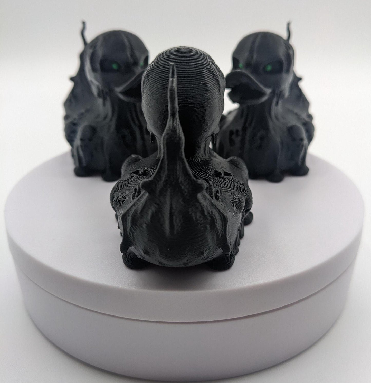 Meet our Scary Evil Spirit Duck, a spooky, quirky 3D-printed, (not painted), creation combining a classic duck with a haunting twist. It's creepy design & eerie features, this duck is perfect for Halloween decor, horror enthusiasts, Jeep duck collectors, or anyone who loves  spooky collectibles. Whether displayed on the dash of your Jeep, perched on your shelf, added to your haunted decorations, or gifted to a lover of the macabre, this evil spirit duck is guaranteed to make a scary statement!