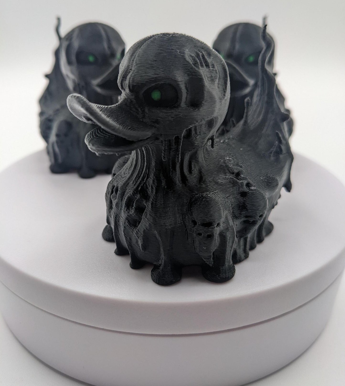Meet our Scary Evil Spirit Duck, a spooky, quirky 3D-printed, (not painted), creation combining a classic duck with a haunting twist. It's creepy design & eerie features, this duck is perfect for Halloween decor, horror enthusiasts, Jeep duck collectors, or anyone who loves  spooky collectibles. Whether displayed on the dash of your Jeep, perched on your shelf, added to your haunted decorations, or gifted to a lover of the macabre, this evil spirit duck is guaranteed to make a scary statement!