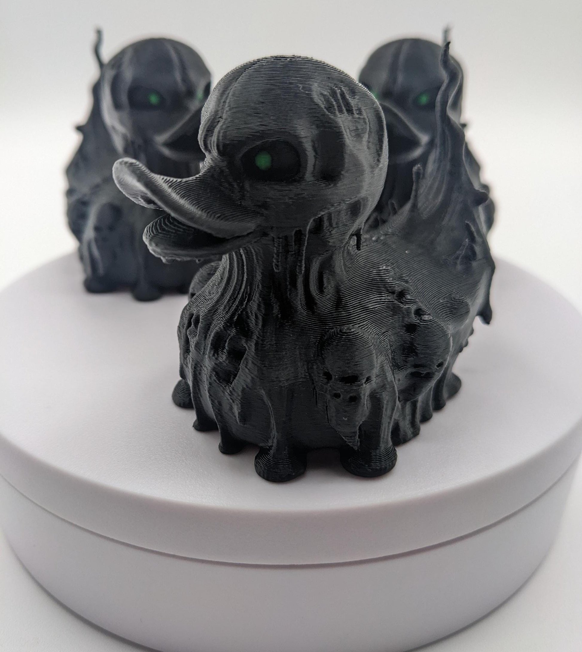 Meet our Scary Evil Spirit Duck, a spooky, quirky 3D-printed, (not painted), creation combining a classic duck with a haunting twist. It's creepy design & eerie features, this duck is perfect for Halloween decor, horror enthusiasts, Jeep duck collectors, or anyone who loves  spooky collectibles. Whether displayed on the dash of your Jeep, perched on your shelf, added to your haunted decorations, or gifted to a lover of the macabre, this evil spirit duck is guaranteed to make a scary statement!