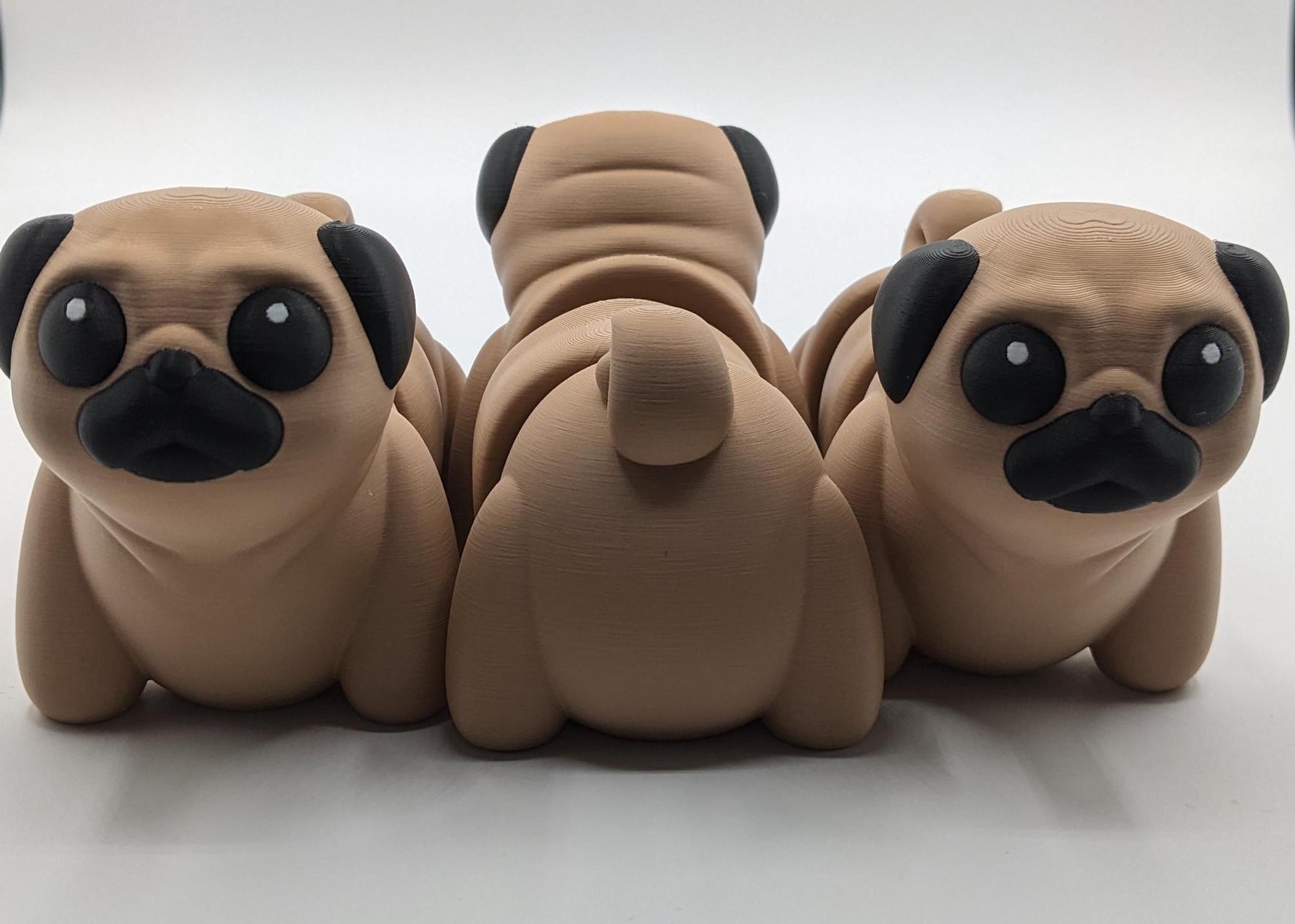 Man's best friend & the clown of the dog breeds, our adorable pug with it's larger size makes it even more fun to handle, while capturing the mischievous charm of your puggy friend. Whether you’re looking for a unique gift, a relaxing fidget toy, or a playful decoration, this pug puppy will bring endless joy & stress relief.