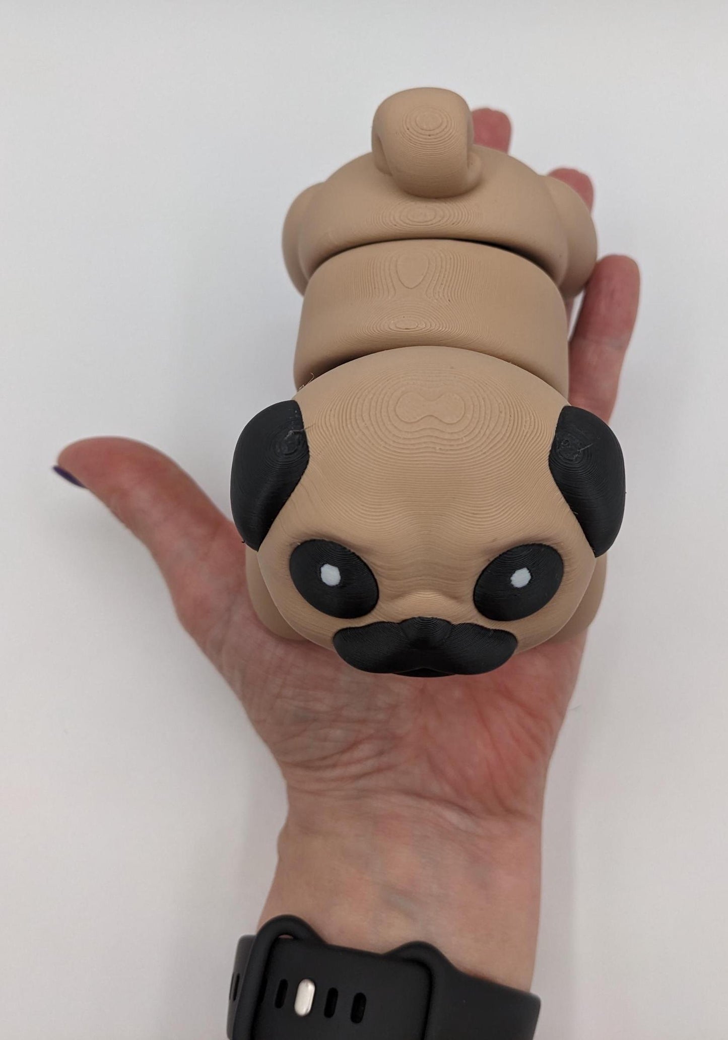 Man's best friend & the clown of the dog breeds, our adorable pug with it's larger size makes it even more fun to handle, while capturing the mischievous charm of your puggy friend. Whether you’re looking for a unique gift, a relaxing fidget toy, or a playful decoration, this pug puppy will bring endless joy & stress relief.