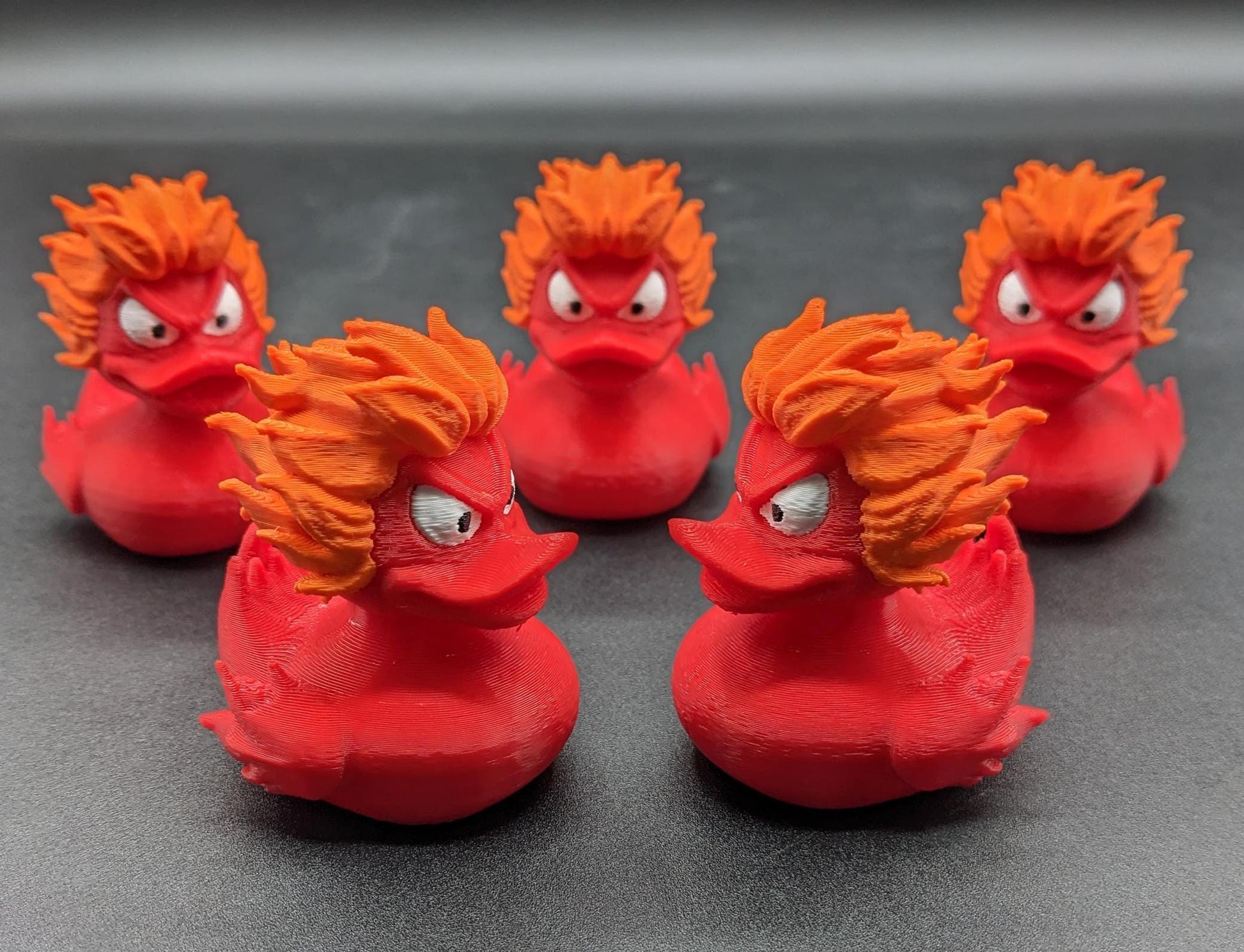 Our fiery duck combines a fierce design with playful charm, making it the perfect gift for the Jeep duck collectors, fidget toy enthusiasts, or anyone looking to add a spark to their decor. With its vibrant fiery colors and detailed craftsmanship, this duck is a true standout.