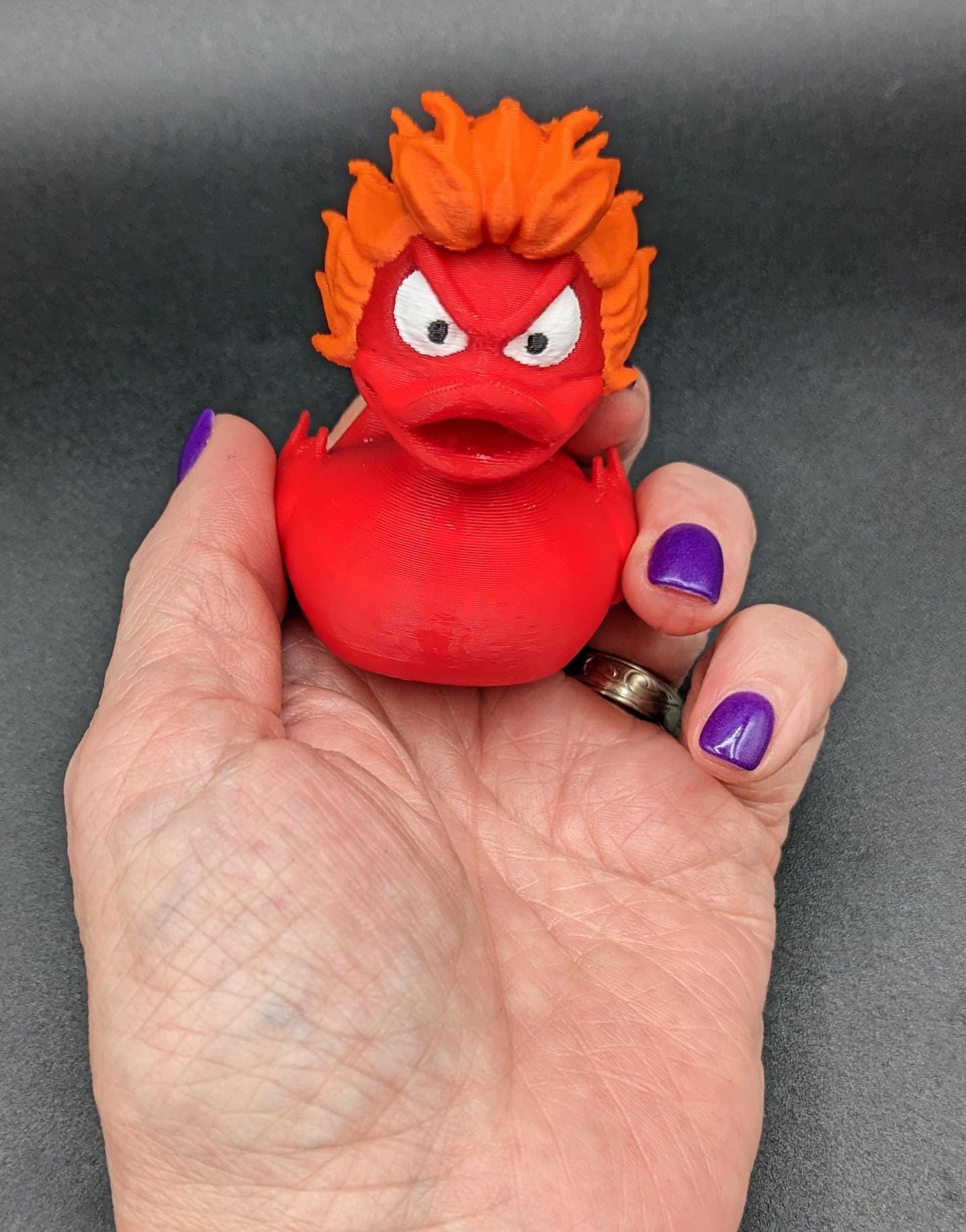Our fiery duck combines a fierce design with playful charm, making it the perfect gift for the Jeep duck collectors, fidget toy enthusiasts, or anyone looking to add a spark to their decor. With its vibrant fiery colors and detailed craftsmanship, this duck is a true standout.