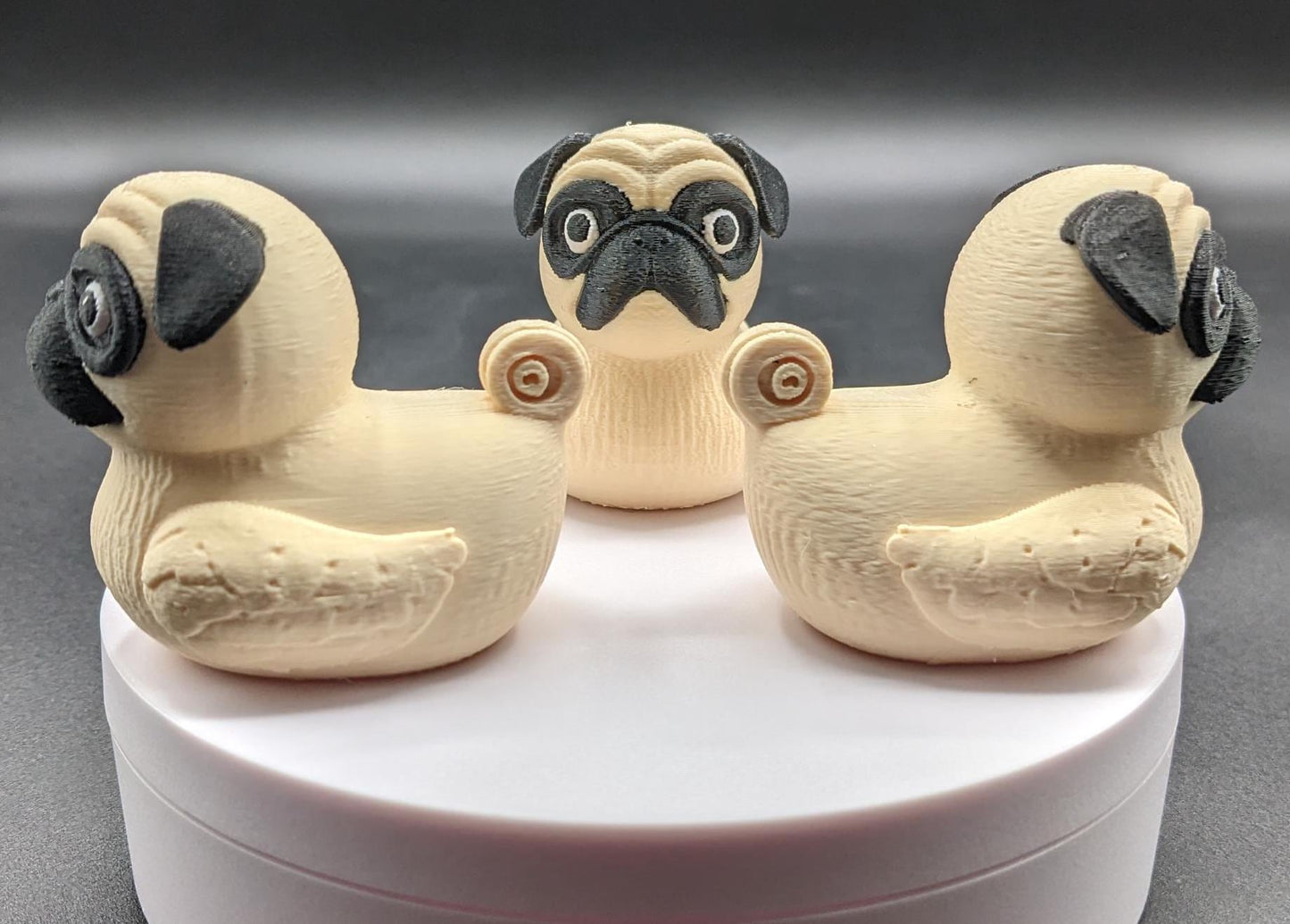 Meet The Fabulous Pug Dog Duck, a delightful 3D-printed creation that combines the charm of a pug with the whimsy of a rubber duck! This quirky and adorable design is perfect for pug lovers, Jeep duck collectors, duck enthusiasts, or anyone who enjoys playful and unique decor. Whether it’s displayed on a shelf, on the dash of your car, used as a conversation starter, or gifted to a dog or Jeep lover, this pug duck is guaranteed to bring smiles and laughter.